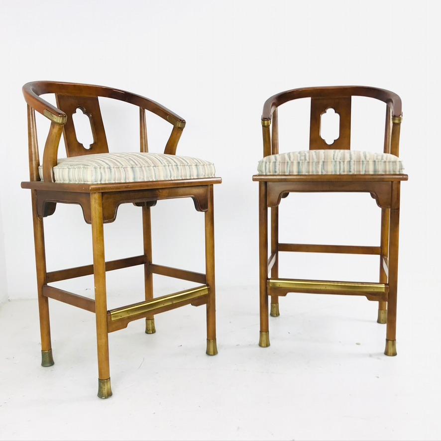 Pair of Mid-Century Modern Ming barstools. Sturdy wood frames with upholstered seats.