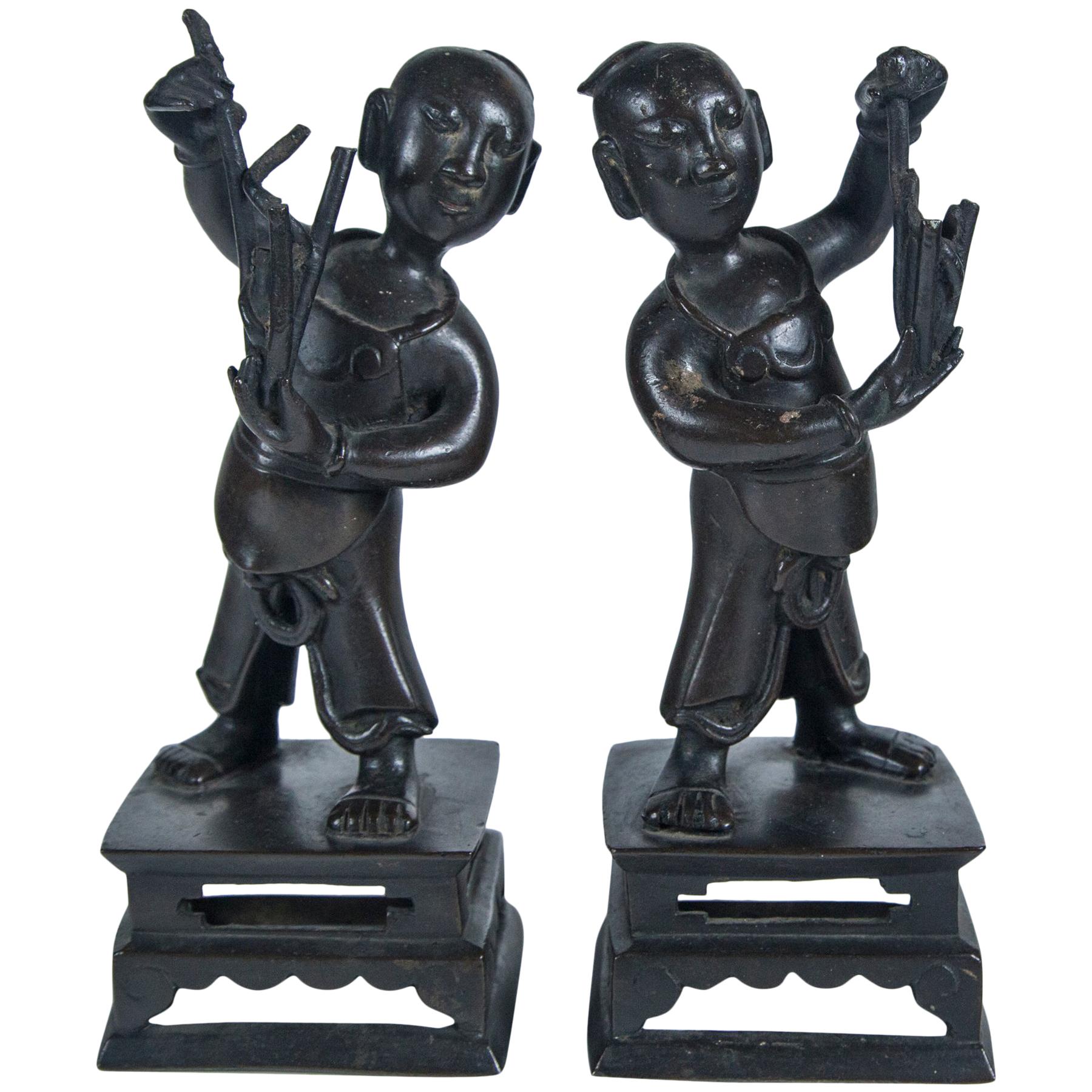 Pair of Ming Dynasty Bronze Figures of Boys