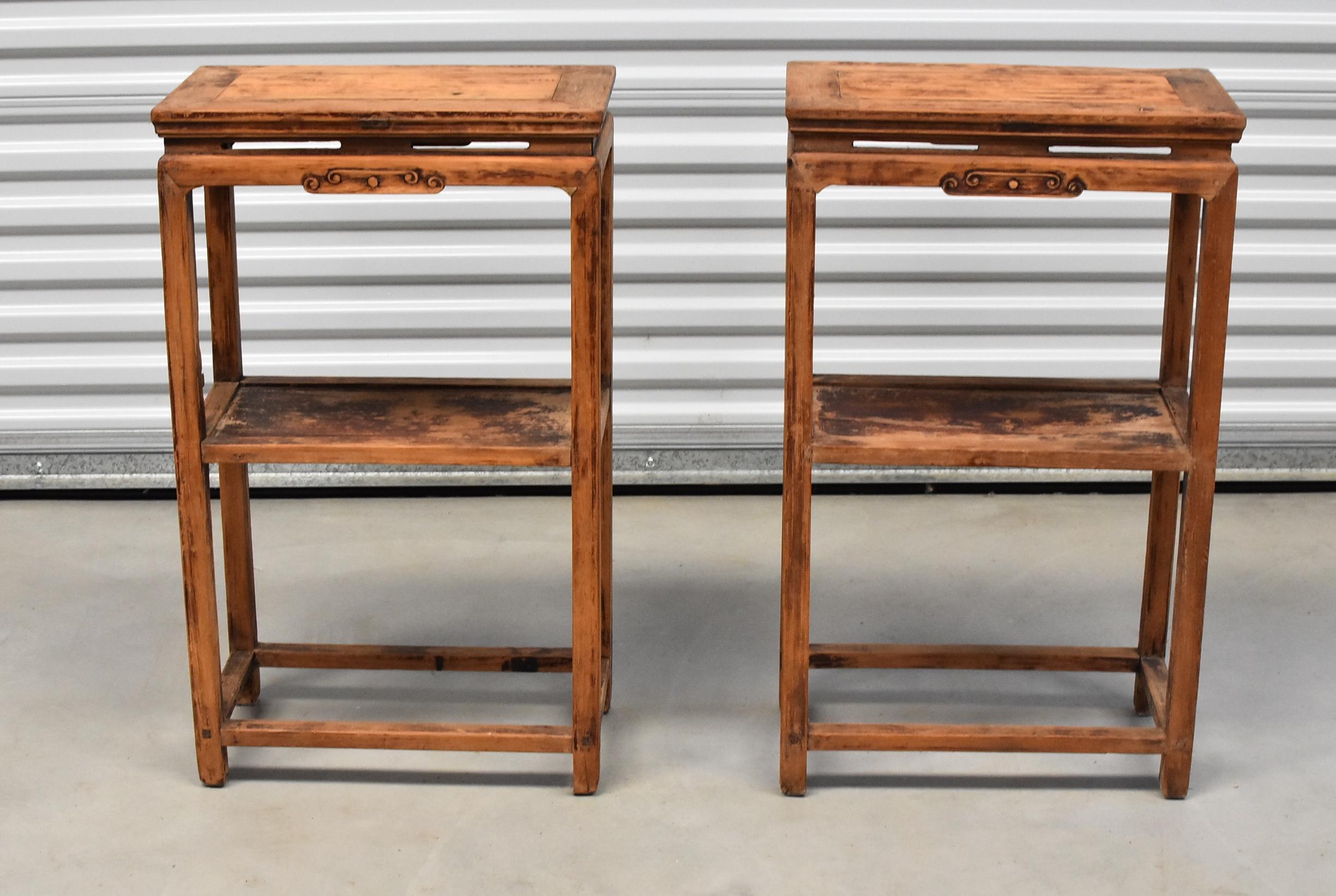 A pair of 19th century Chinese side tables. This pair of tables have beautiful narrow lines. The style is very much a Ming design, with elegant lines void of frivolous decorations. All original. Solid wood. Tenons and mortises.