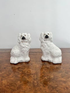 Pair of miniature antique Victorian Staffordshire dogs