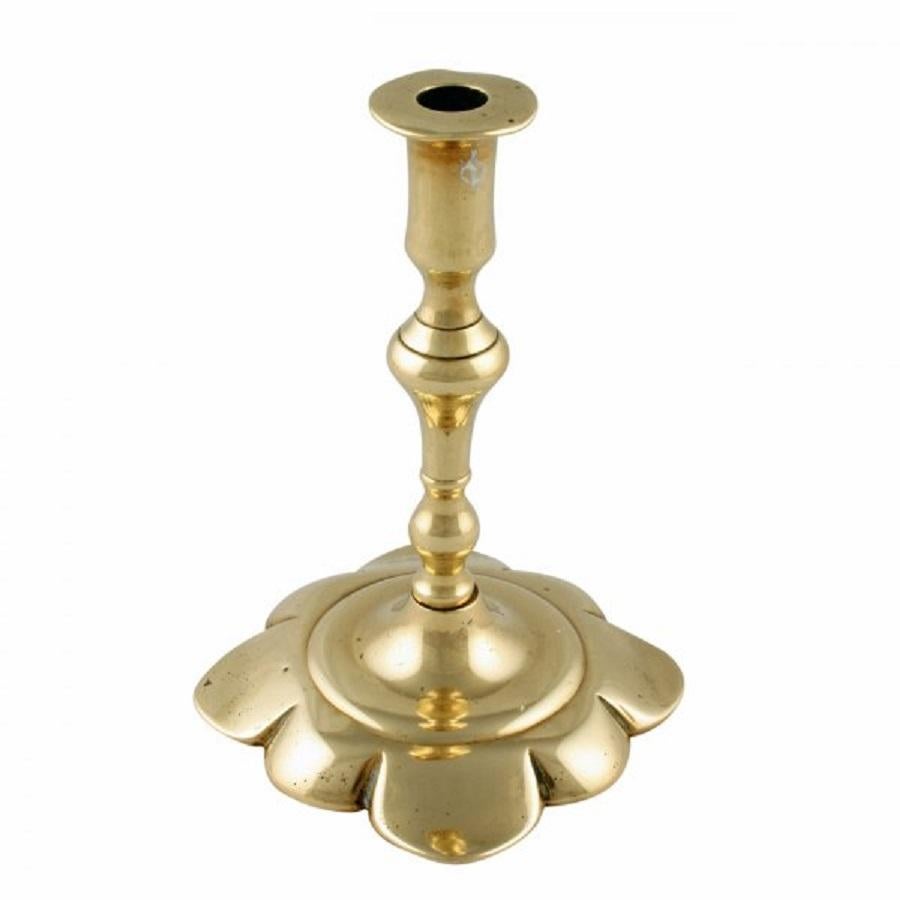 A pair of 19th century Victorian miniature brass candlesticks in a Georgian style.

The candlesticks are copies of Georgian petal base candlestick made in two parts.

The candlesticks are in good condition. (Circa 1850)

Measures: Height