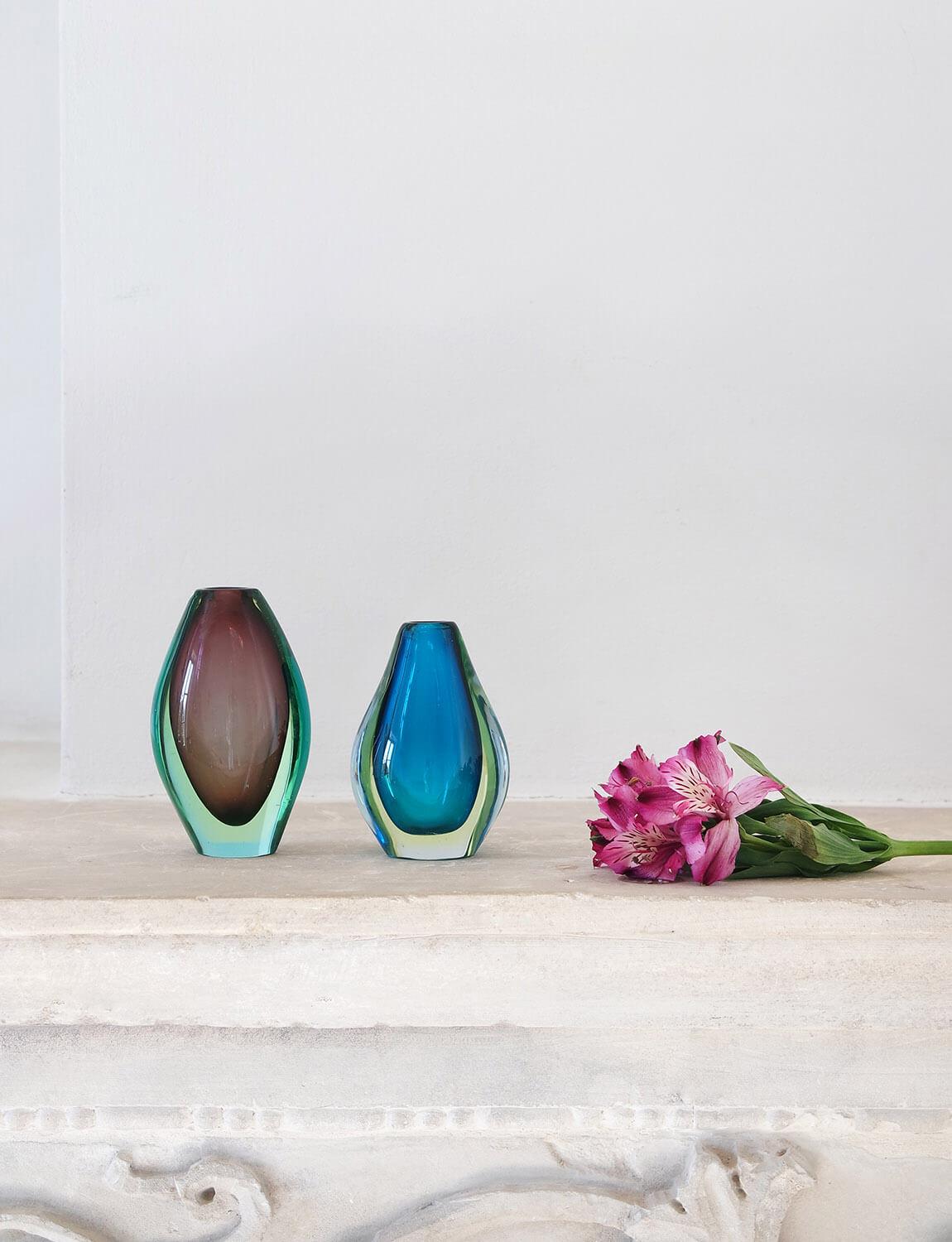 A delightful pair 1960s miniature sommerso (submerged glass) vases found here in Italy and designed by Flavio Poli. One vase has a brown glass core which has been submerged in a pale green glass, the other vase, a deep sea blue core submerged in