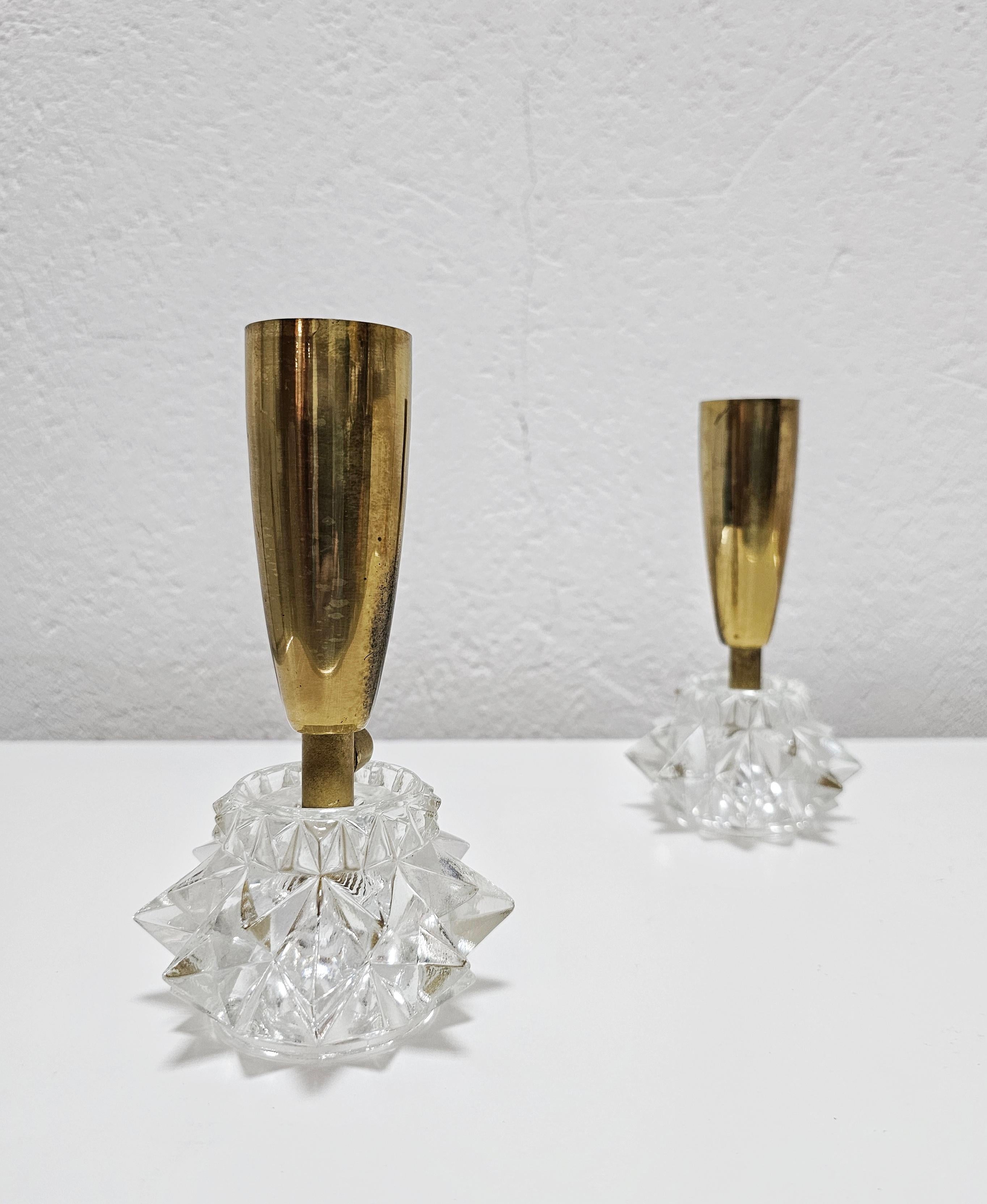 In this listing you will find a pair of miniature Mid Century Modern table lamps done in brass, with the glass bases. Each lamp has one light, requiring am E14 light bulb with a European screw. Made in Austria in 1960s. 

Very good vintage