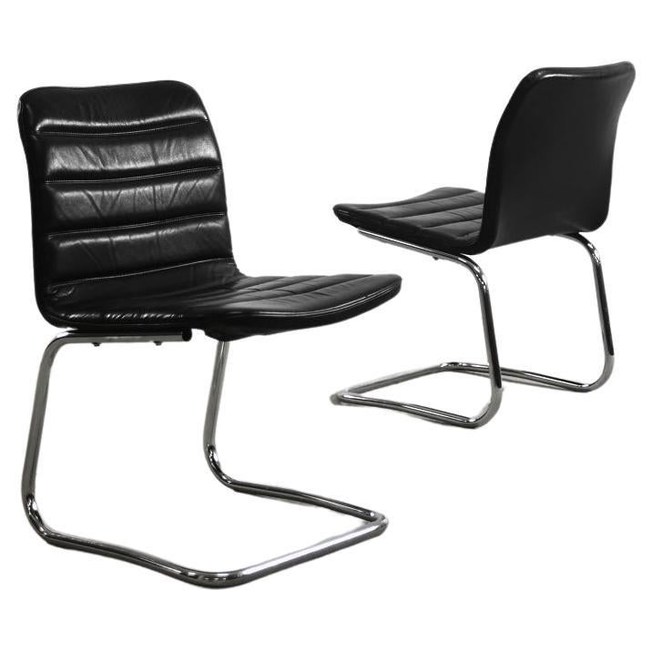 Pair of Minimalist Chrome & Black Leather Club Chairs from Pol International For Sale