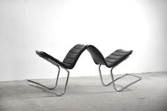 Pair of Minimalist Chromed Black Leather German Chairs by Pol International 1960