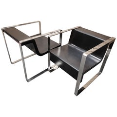 Pair of Minimalist Meeting Point Stainless Steel Lounge Chairs by Cabanes