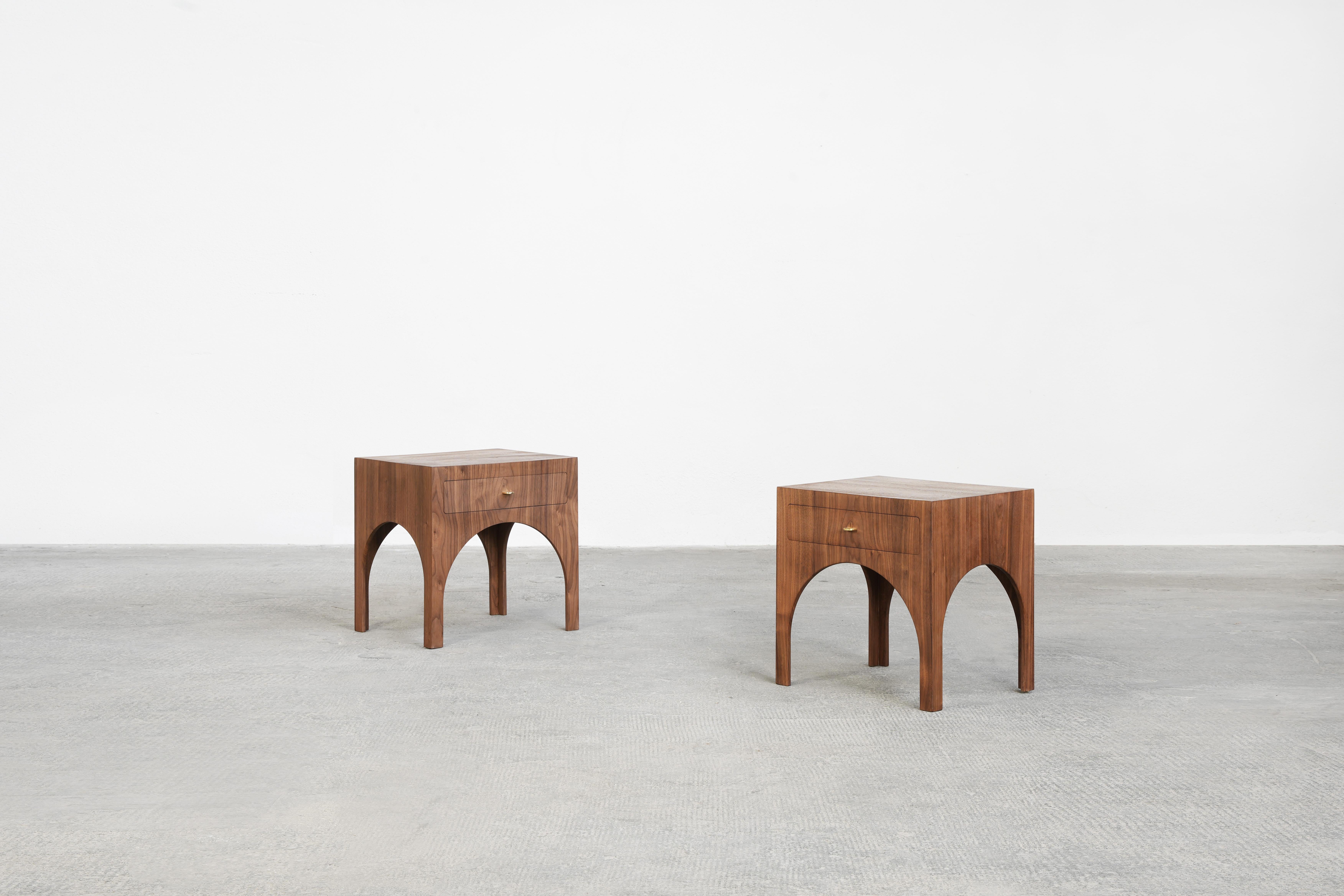A beautiful pair of nightstands designed by Yuzo Nakamura-Bachmann, handcrafted in Germany.
These nightstands are made out of solid American Walnut and brass handles. Finished with natural furniture wax.