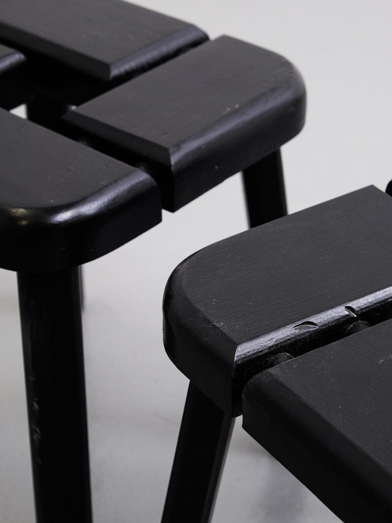 A pair of stools in sculpted and joined solid pine, painted black. Features beautiful revealed joinery. Design attributed to Olof Ottelin, produced in Finland, 1960s.
 