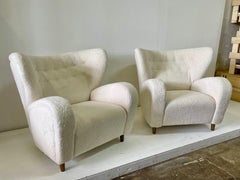 Coppia di poltrone alate moderne francesi