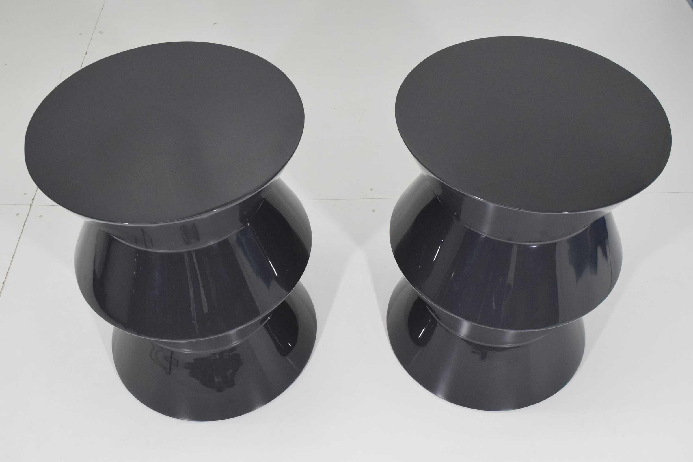 Newly refinished in a dark gray lacquer, these tables are substantial. High gloss finish.