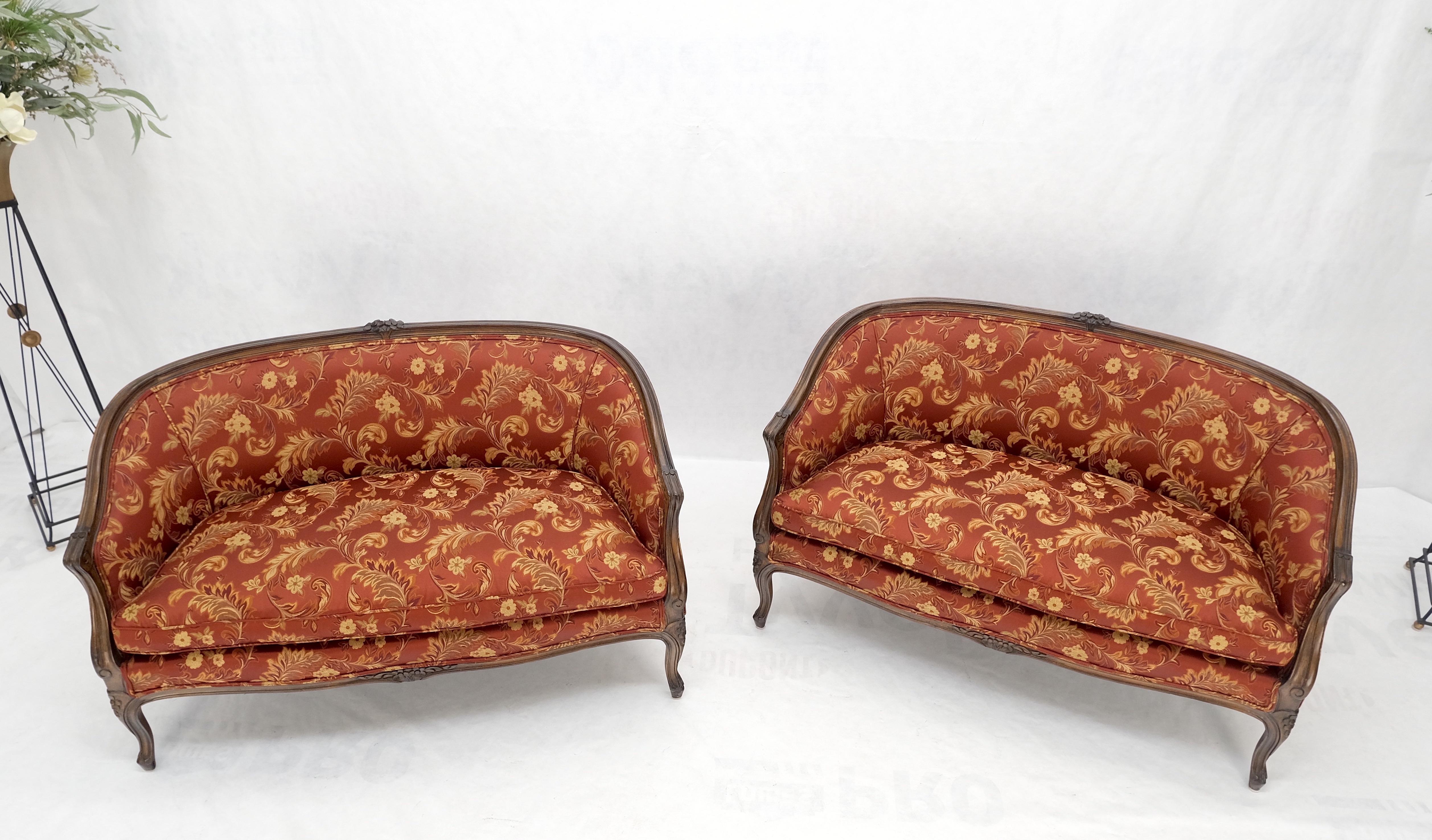 Pair of mint condition carved walnut country french down cushions compact sofas.