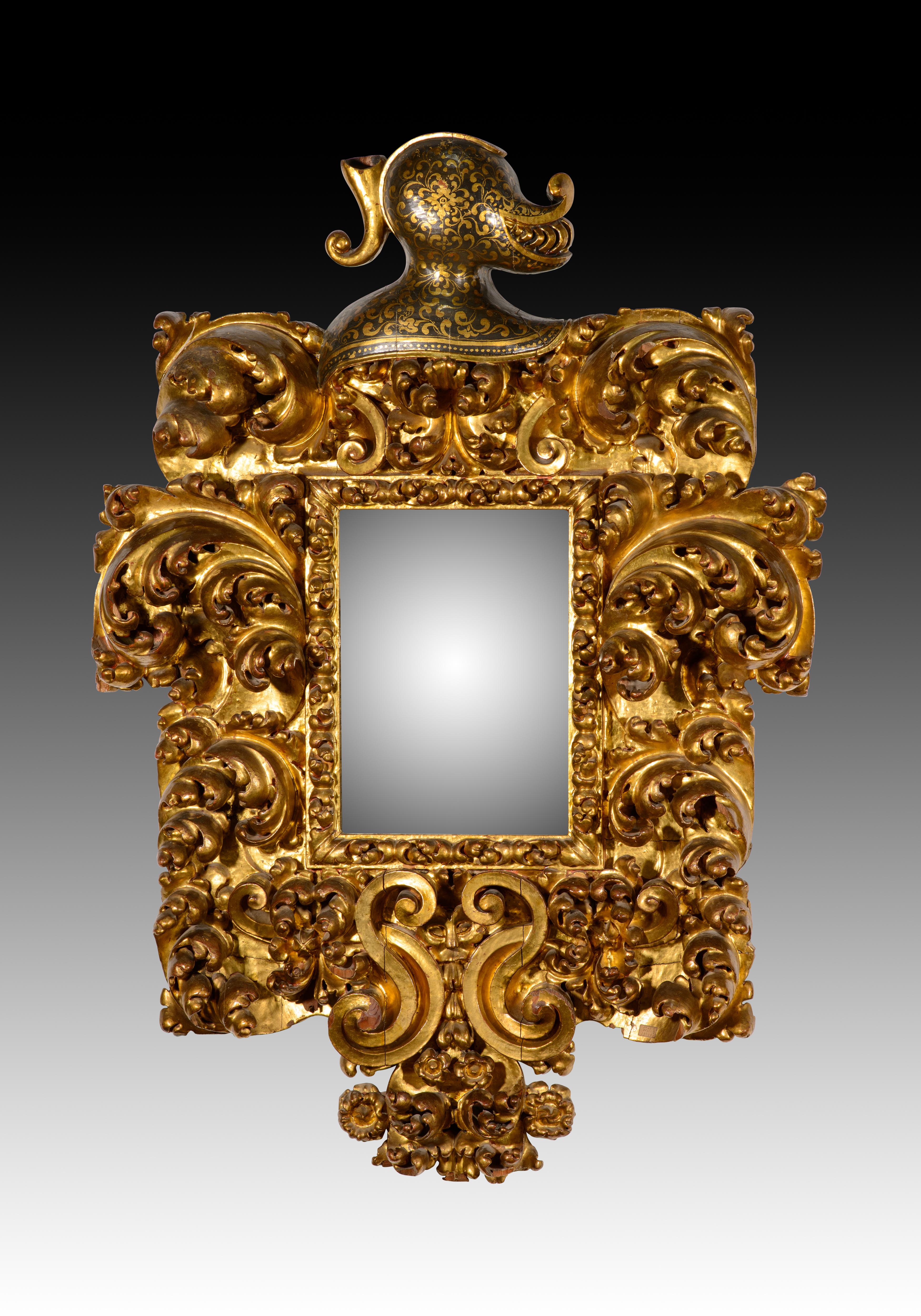  Paire de miroirs. Bois sculpté et polychrome. Spanish School, XVIIe siècle. 
Paire de miroirs muraux, chacun avec un cadre rectangulaire et un cadre proéminent en bois sculpté, polychrome et doré. Ces éléments sont disposés symétriquement et