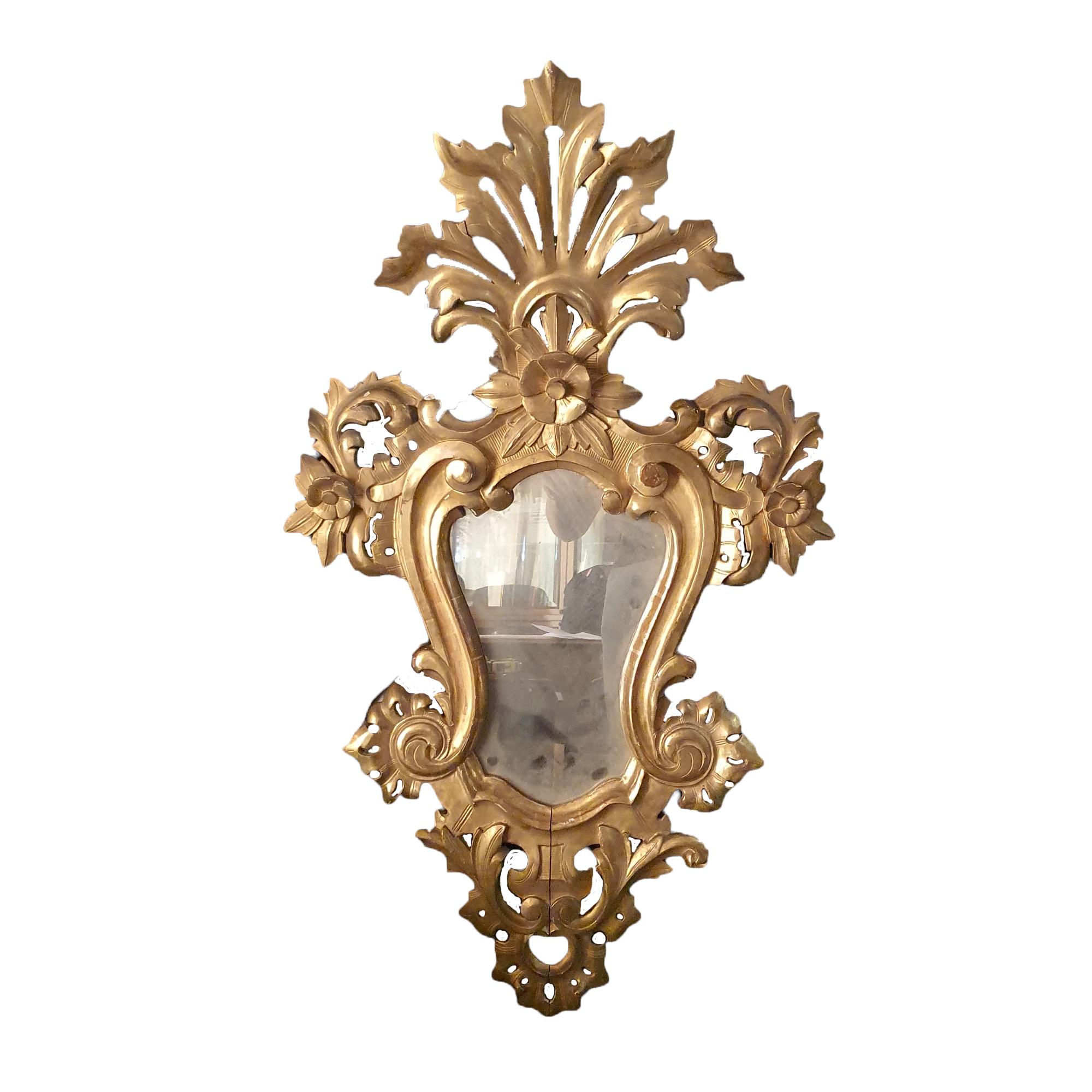 Elegant Pair of Mirrors in Carved and Gilded Wood, Pure Gold Leaf. Louis XV style, made in Italy in the 19th century.
