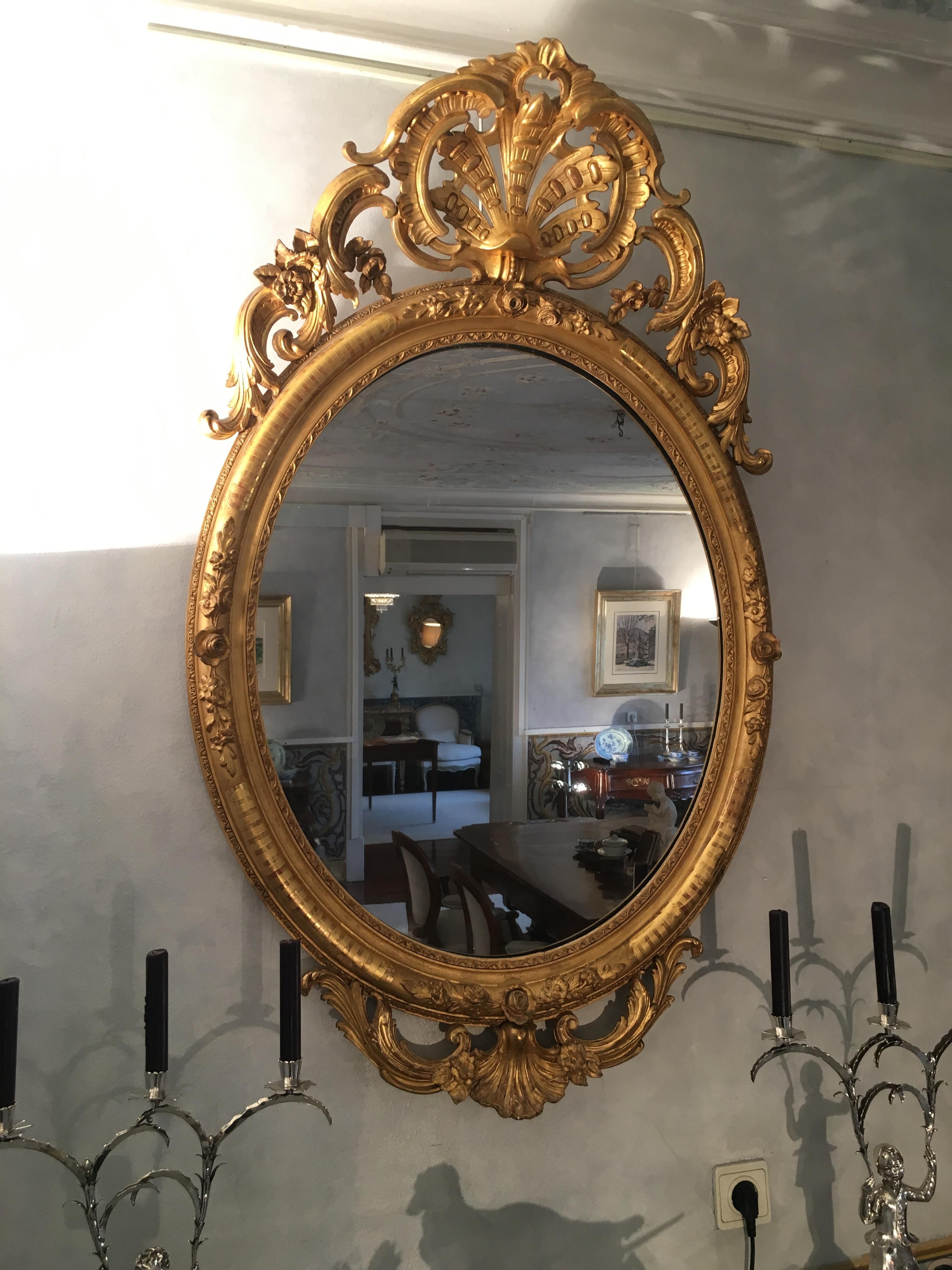 Gilt Pair of Mirrors in Carved and Guilt wood. French, 19th century  For Sale