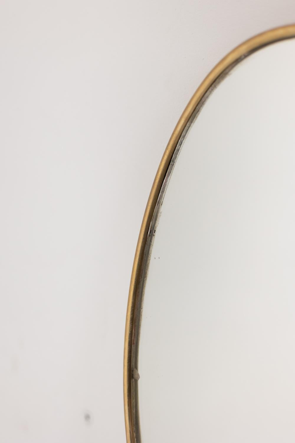 Doré Paire de miroirs dans le style de Gio Ponti Circa 1970. en vente