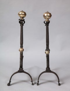 Paire de chenets en métal mélangé