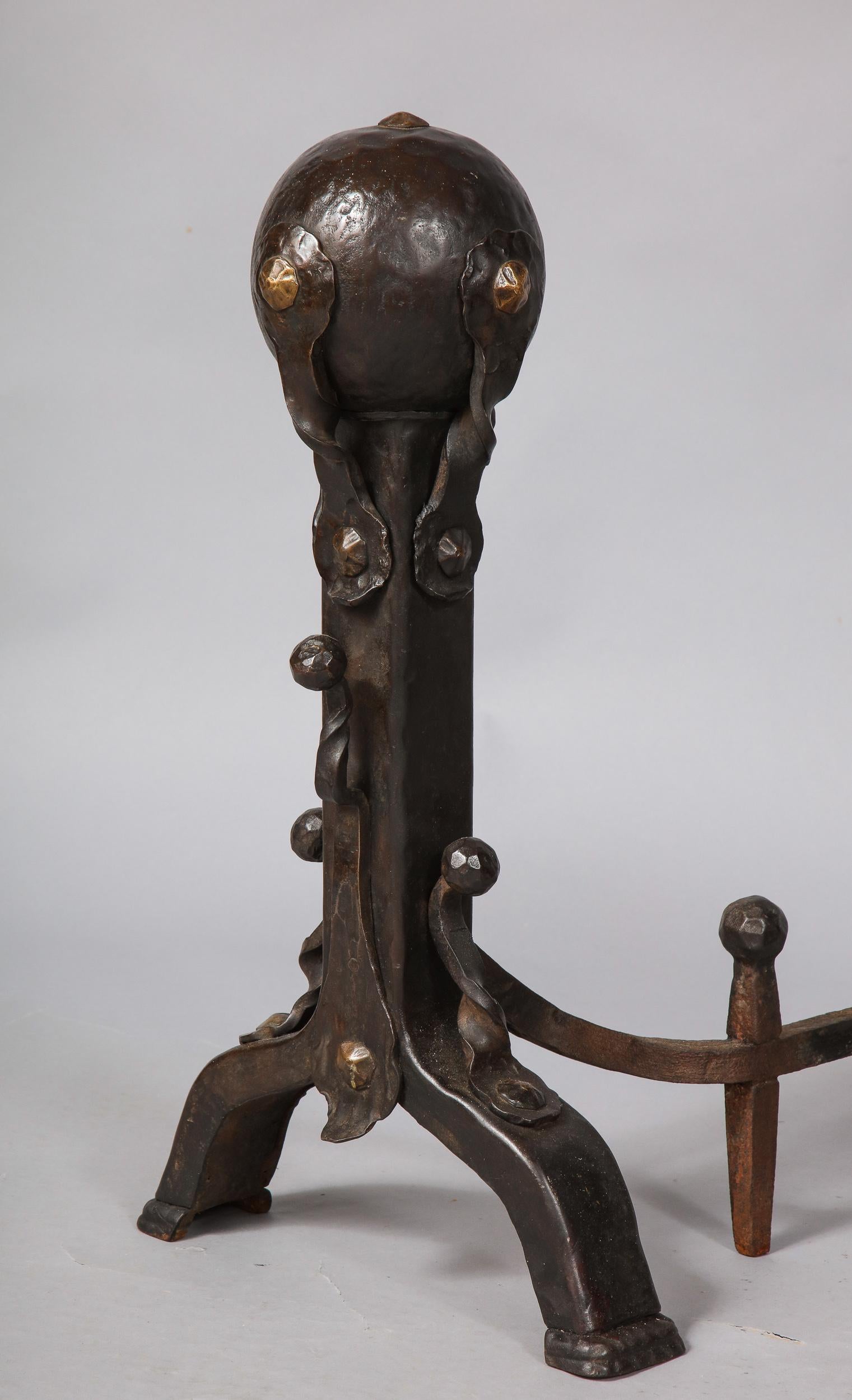 20th Century Pair of Iron and Bronze Strapwork Sphere Andirons For Sale
