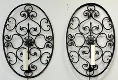 Pair of Mizner Style Neoclassic Pierced Bronze Oval Shield Sconces
