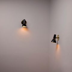 Pair of Model 109 Sconces by Guiseppe Ostuni for Oluce