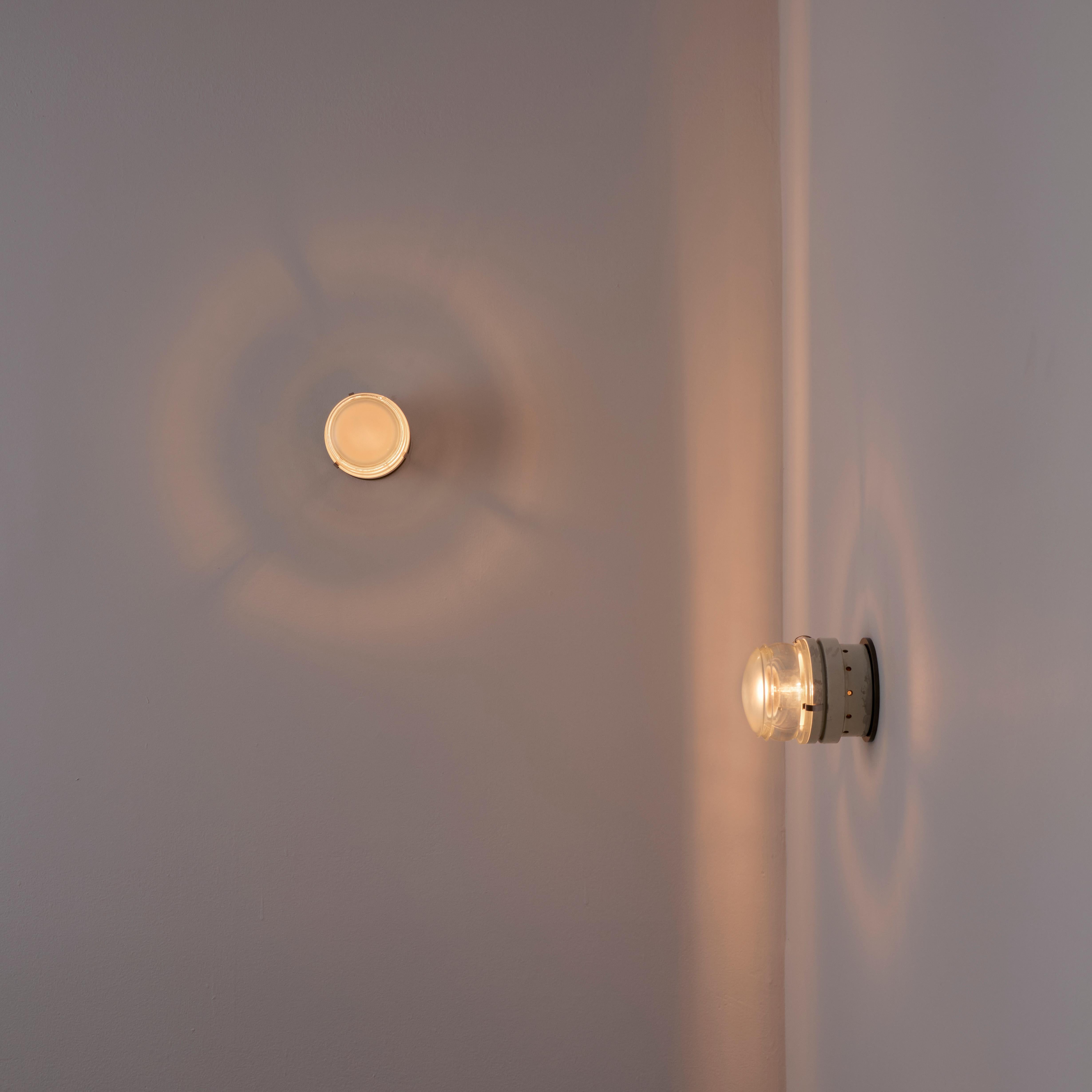 Italian Pair of Model 1148 Fresnel Wall/Ceiling Lights by Joe Colombo for O-Luce For Sale