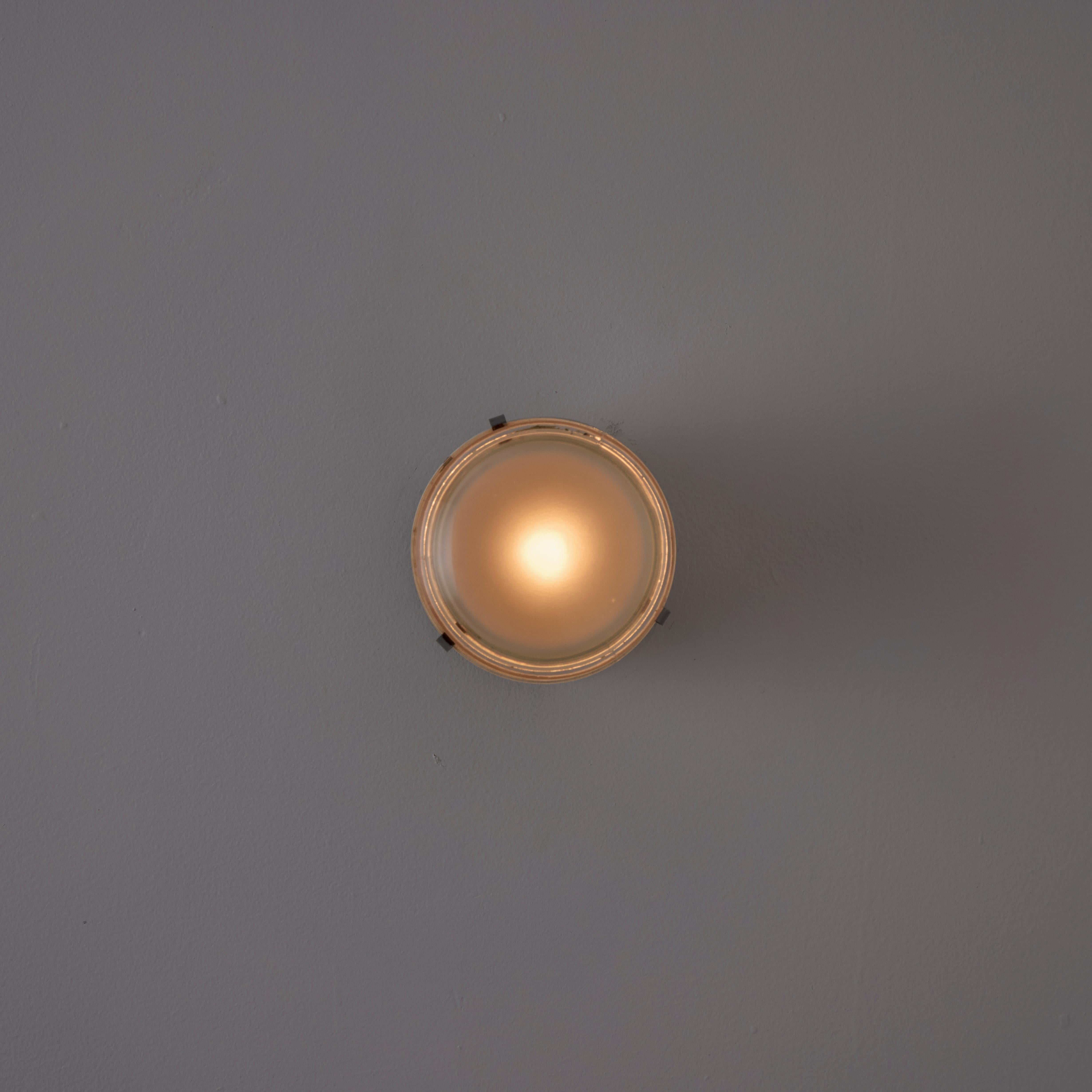 Brass Pair of Model 1148 Fresnel Wall/Ceiling Lights by Joe Colombo for O-Luce For Sale