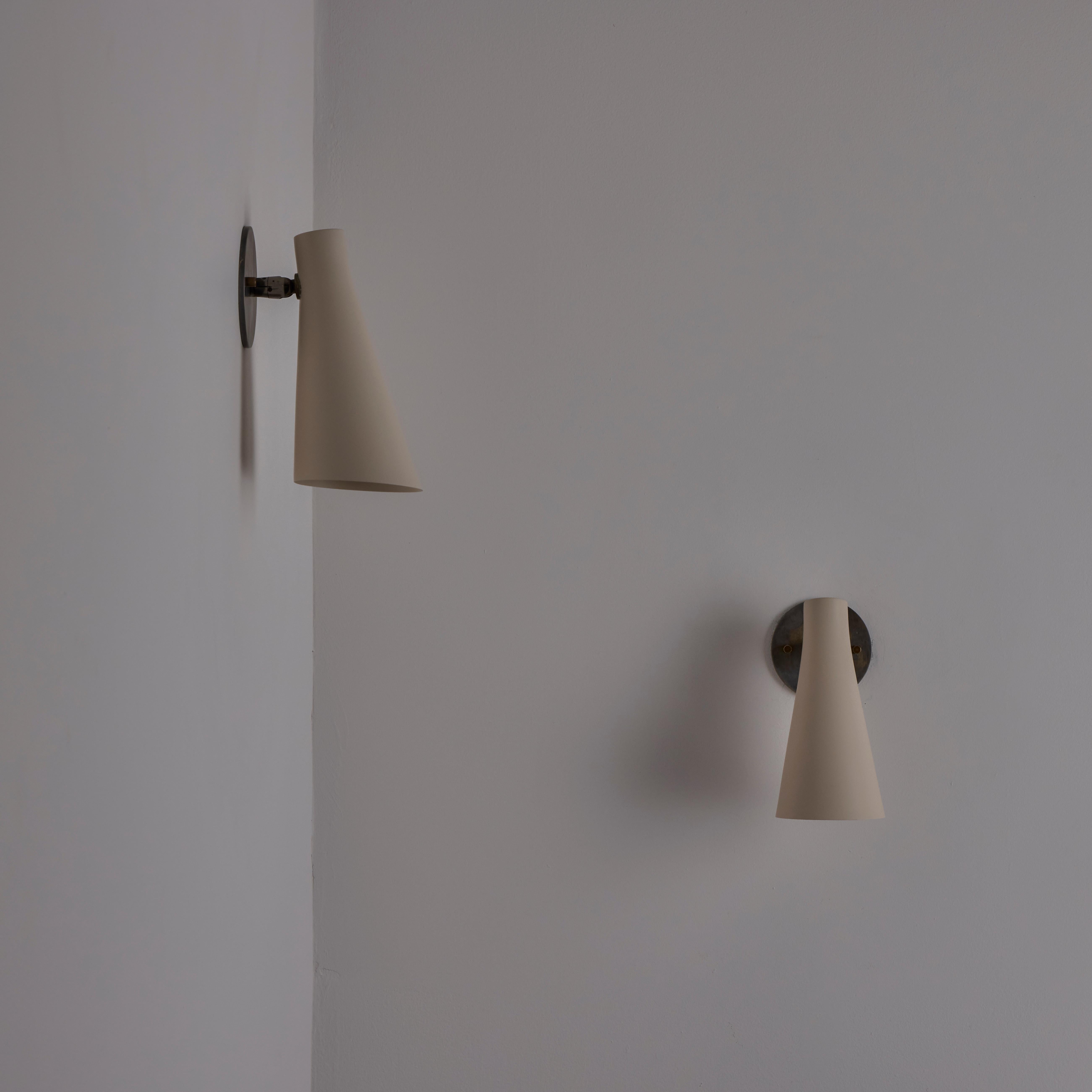 Italian Pair of Model 138 Sconce by Giuseppe Ostuni for Oluce For Sale