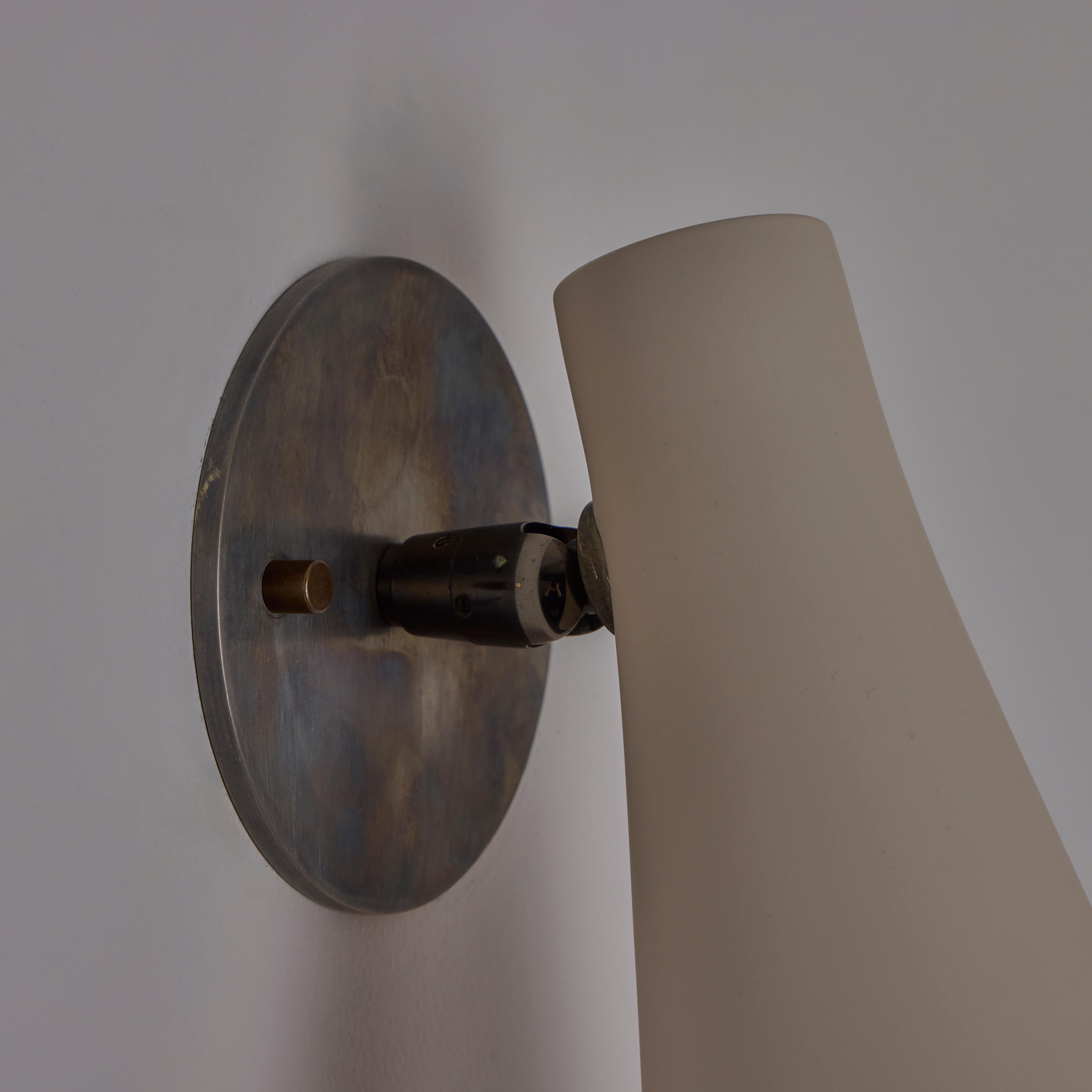 Aluminum Pair of Model 138 Sconce by Giuseppe Ostuni for Oluce For Sale