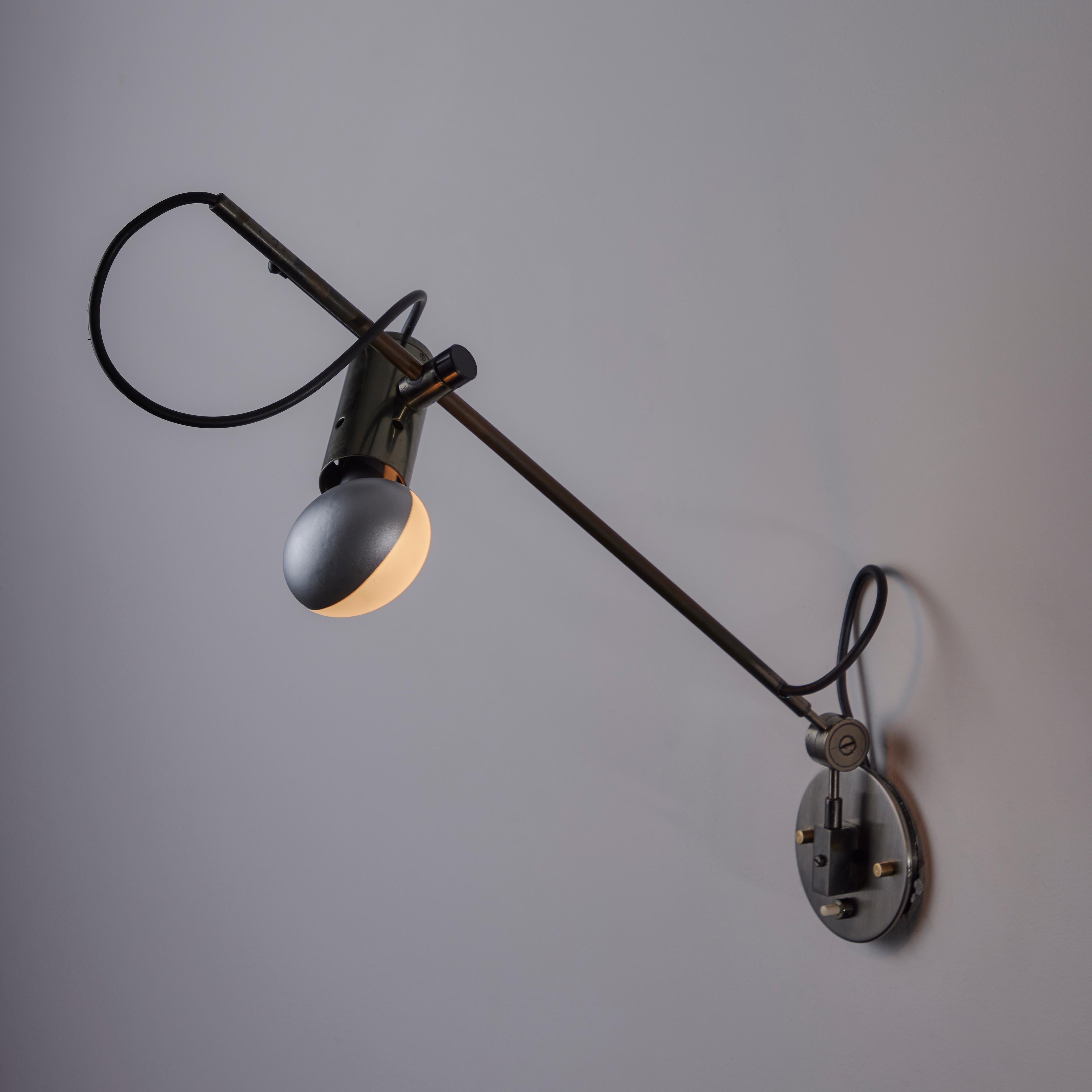 Mid-20th Century Pair of Model 194 Sconces by Tito Agnoli for Oluce
