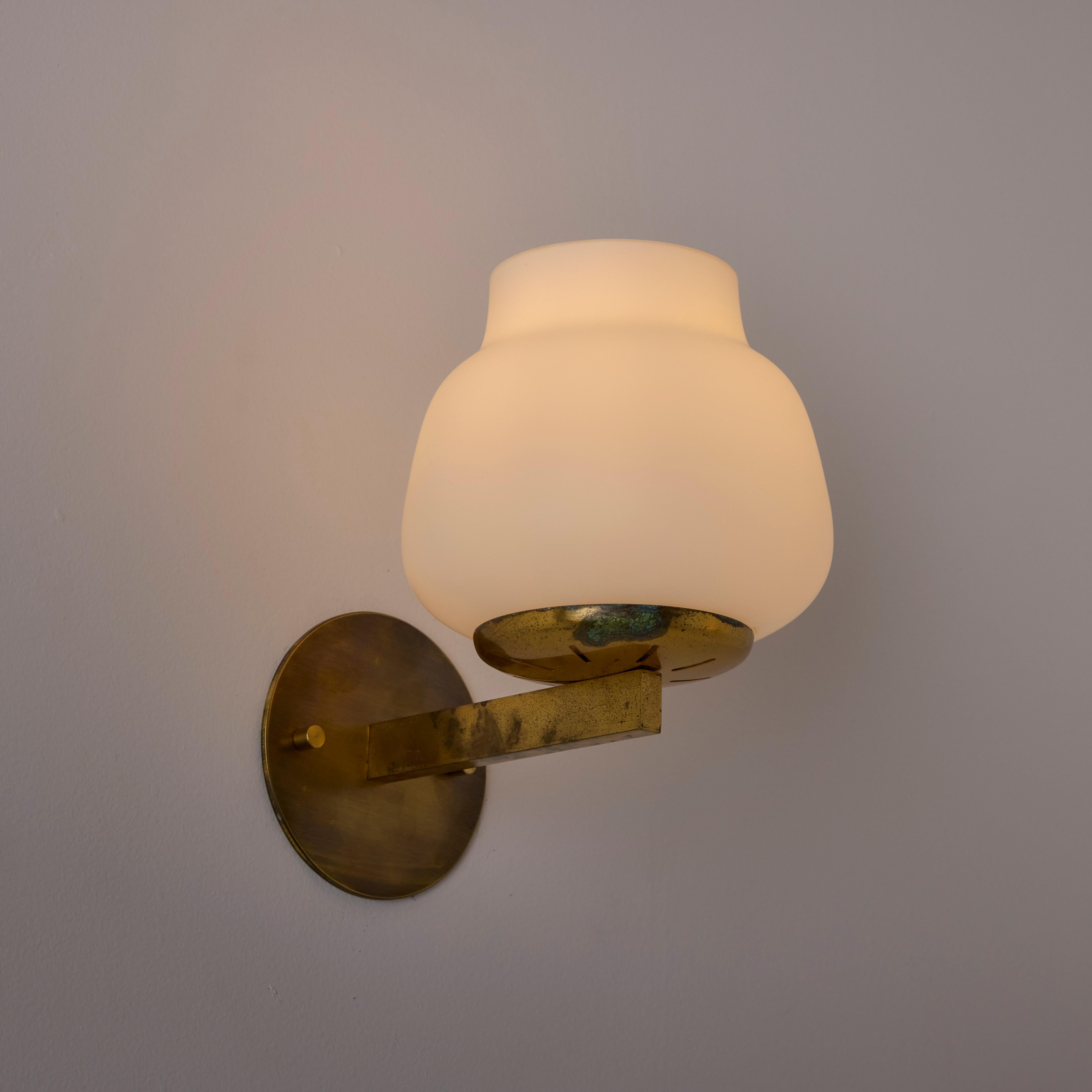 Pair of model 2078 Sconces by Pierre Disderot Francés en venta