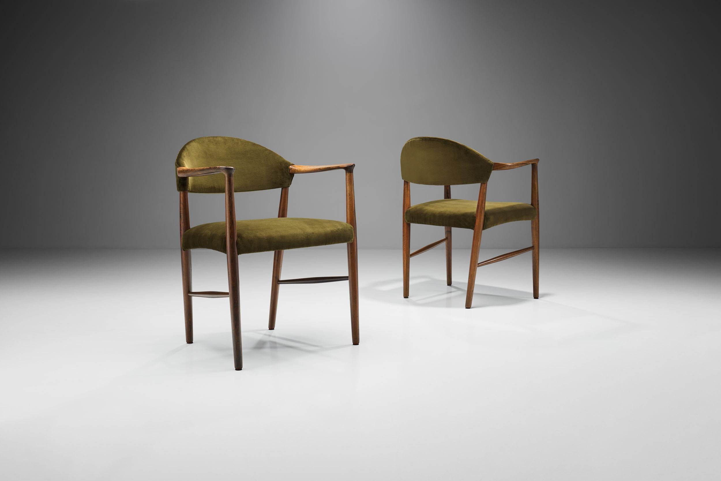 This pair of “Model 223” armchairs are Classic examples of midcentury Scandinavian design. The design is timeless and modern with great attention to quality and function.

The Danish designer, Kurt Olsen is known as a furniture architect who liked