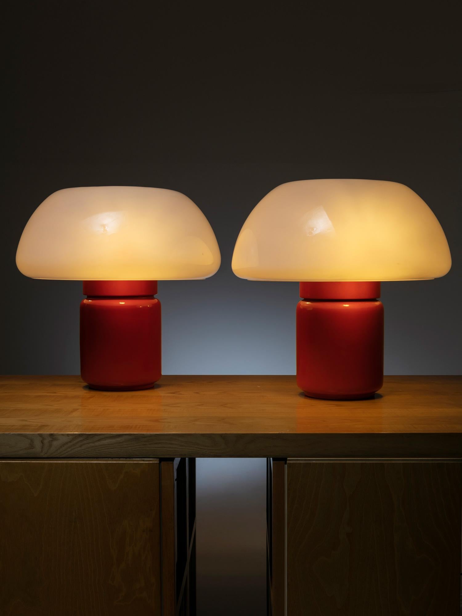 Set of two table lamps model 625 by Elio Martinelli for Martinelli Luce.
Rare orange metal body and large plastic shade