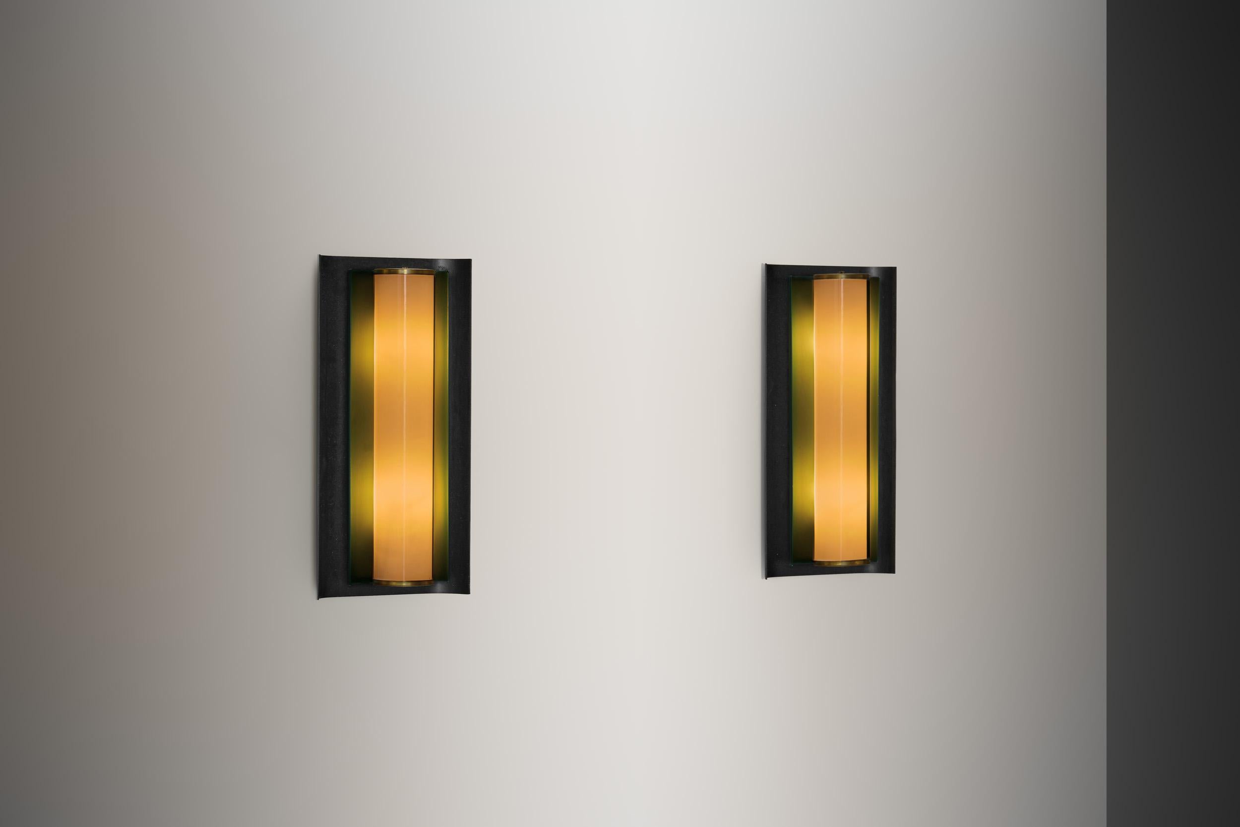 This pair of wall lamps by CeBe, exemplifies a refined blend of functionality and early modernist aesthetics. With their distinctly rectangular silhouette, the lamps reflect subtle Art Deco influences, characterised by streamlined geometry and