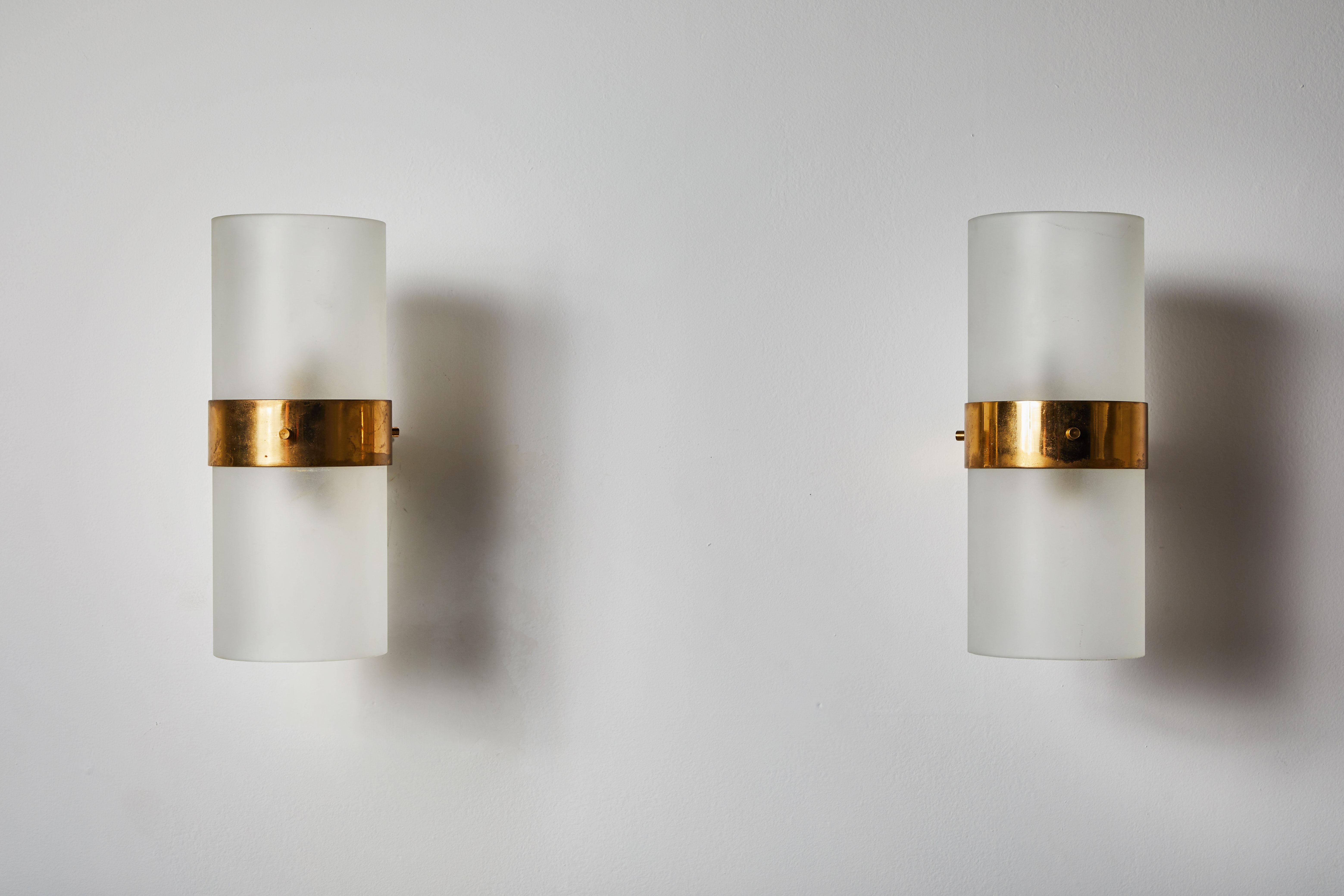 Pair of Model B324 Sconces by Candle. The year of manufacturer is 1970.