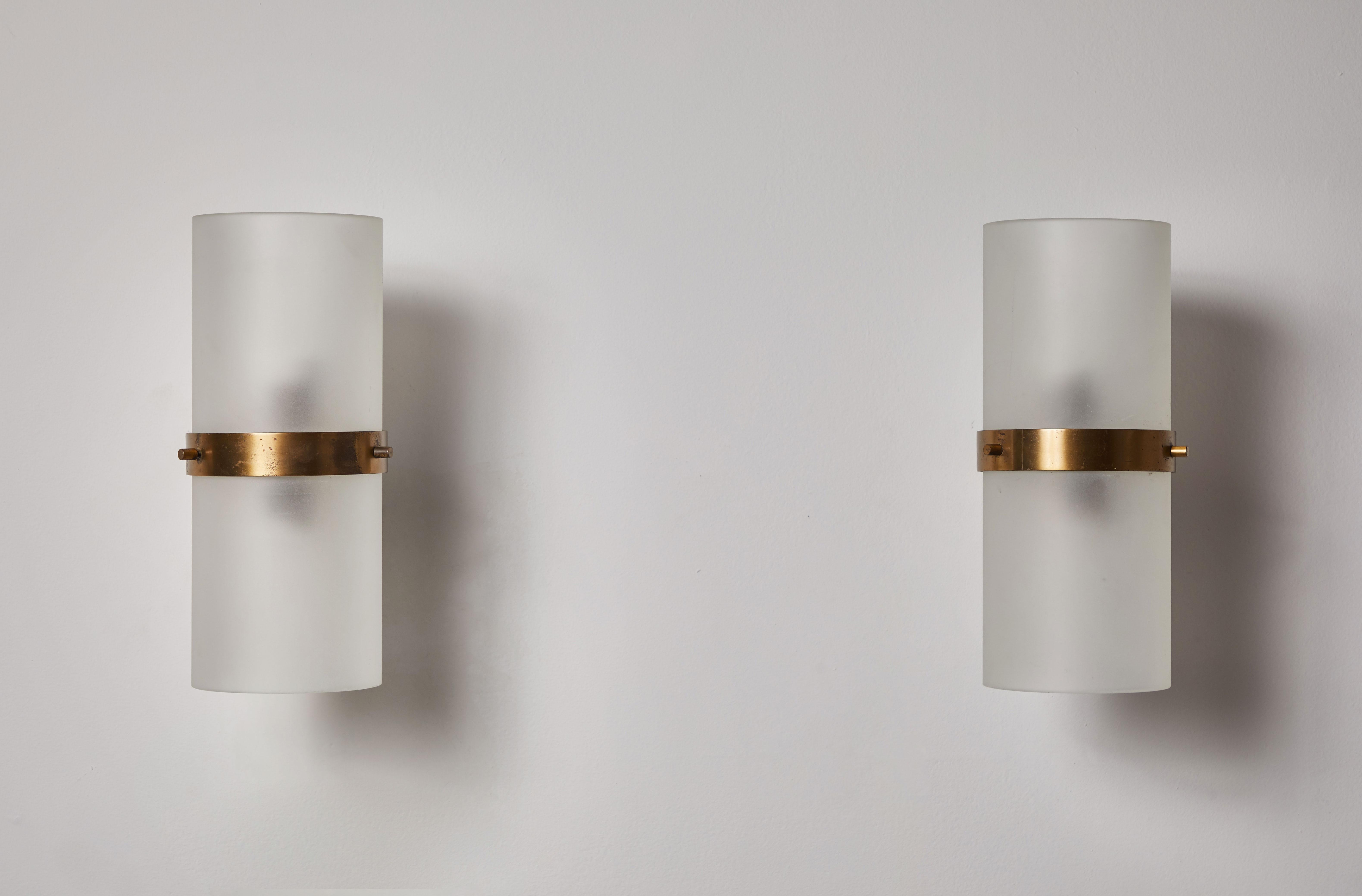 Pair of Model B324 Sconces by Candle. The year of manufacturer is 1970.