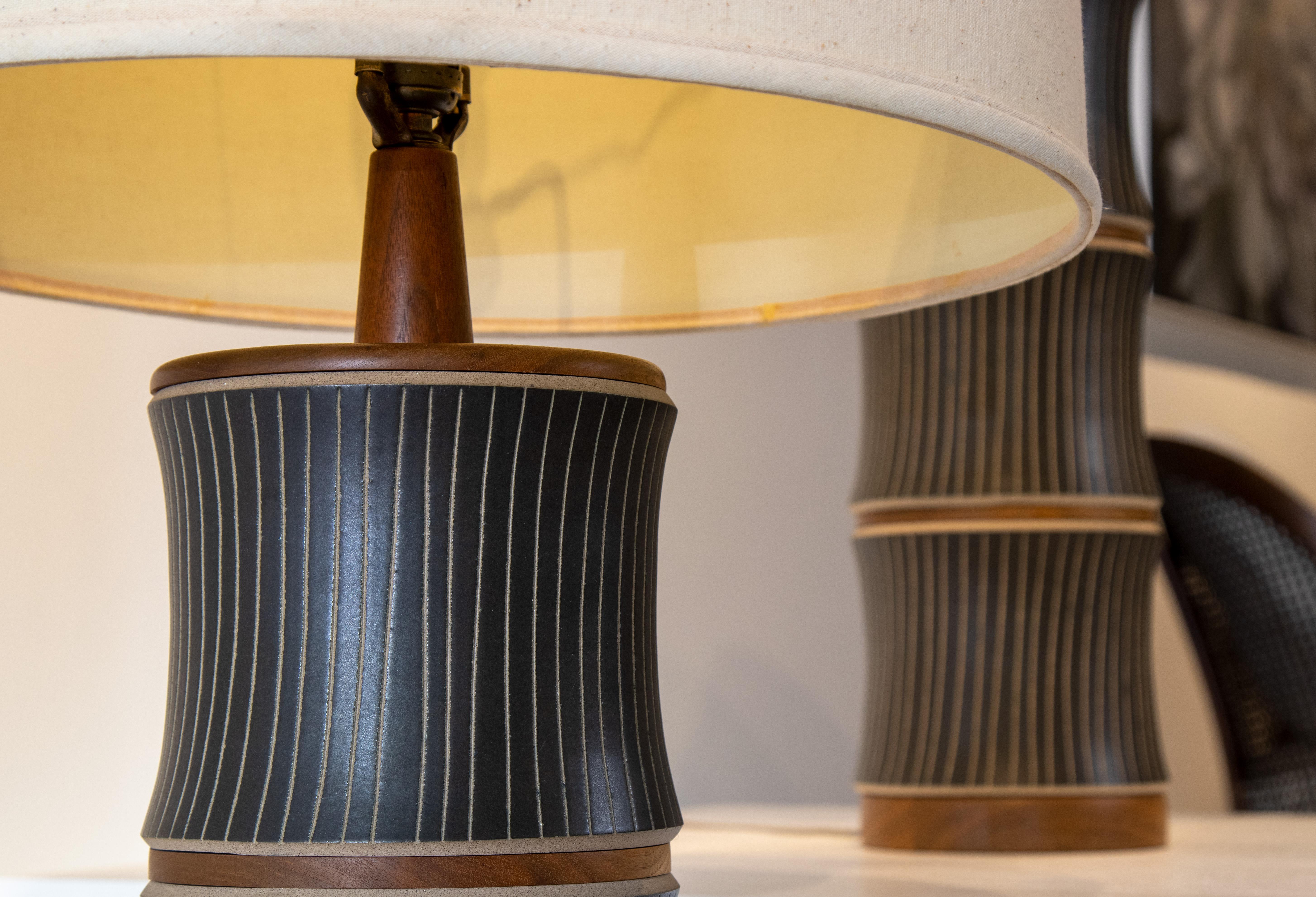 Mid-20th Century Pair of Model M221 Jane and Gordon Martz Lamps in Matte Black with Tan Incising