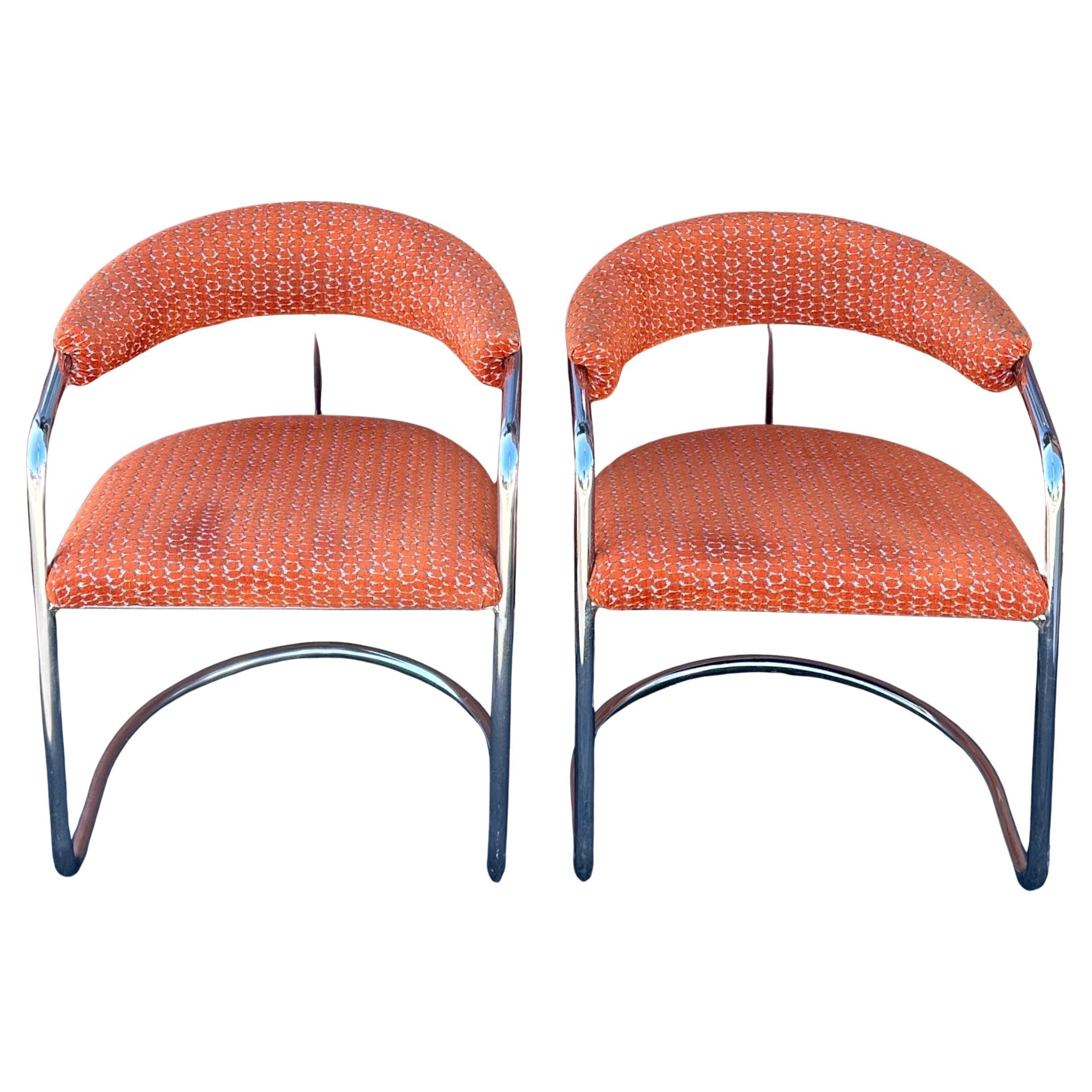 Pair of vintage Model SS33 chrome Bauhaus style arm chairs by Anton Lorenz for Thonet, circa 1970s. The pair are in very good vintage condition and measure 23