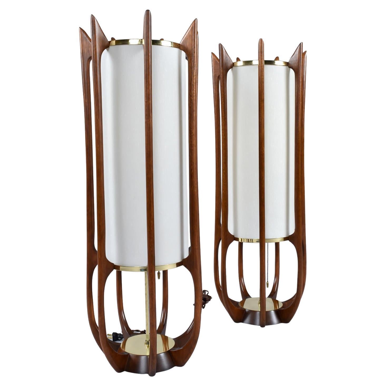Pair of Modeline 635 model designed by Arthur Jacobs. The original advertisement describes these lamps as having a Japanese influence. One can see the similarities of Jacobs design with common Japanese aesthetics. His cylinder shape with sheer white