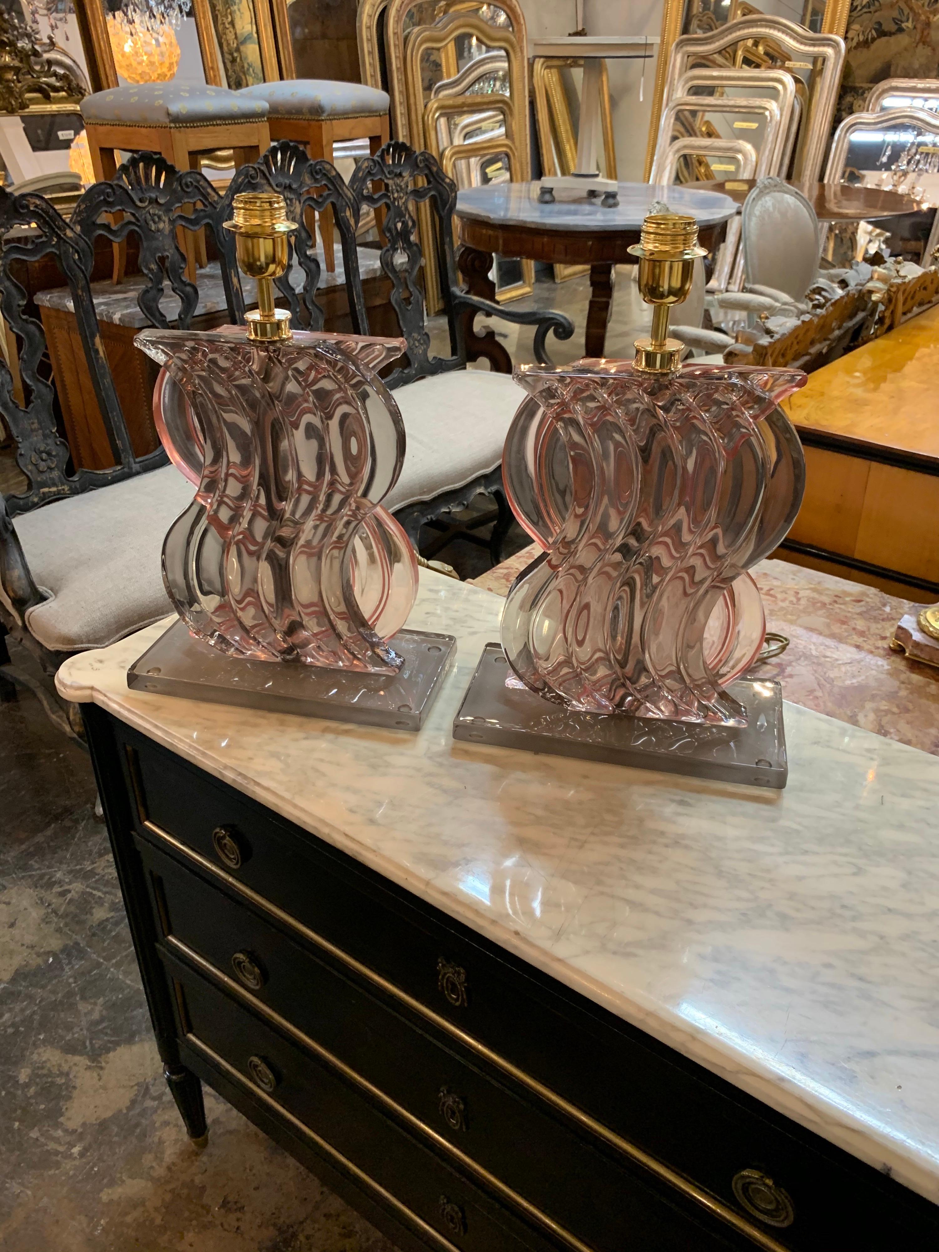 Fabulous pair of modern 2 sided pink and black Murano glass lamps. Beautiful decorative wavy pattern on a glass base. Very special!