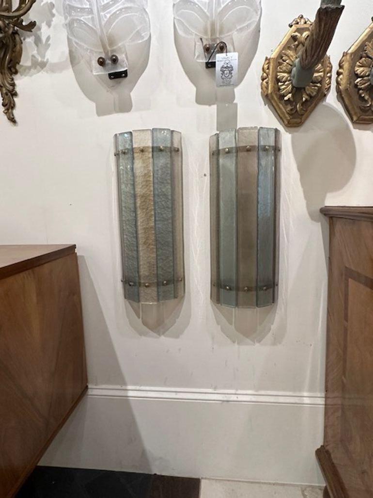Fine pair of Modern 2-tone Murano glass sconces. Creates a very elegant look! Note:These come in a variety of colors.