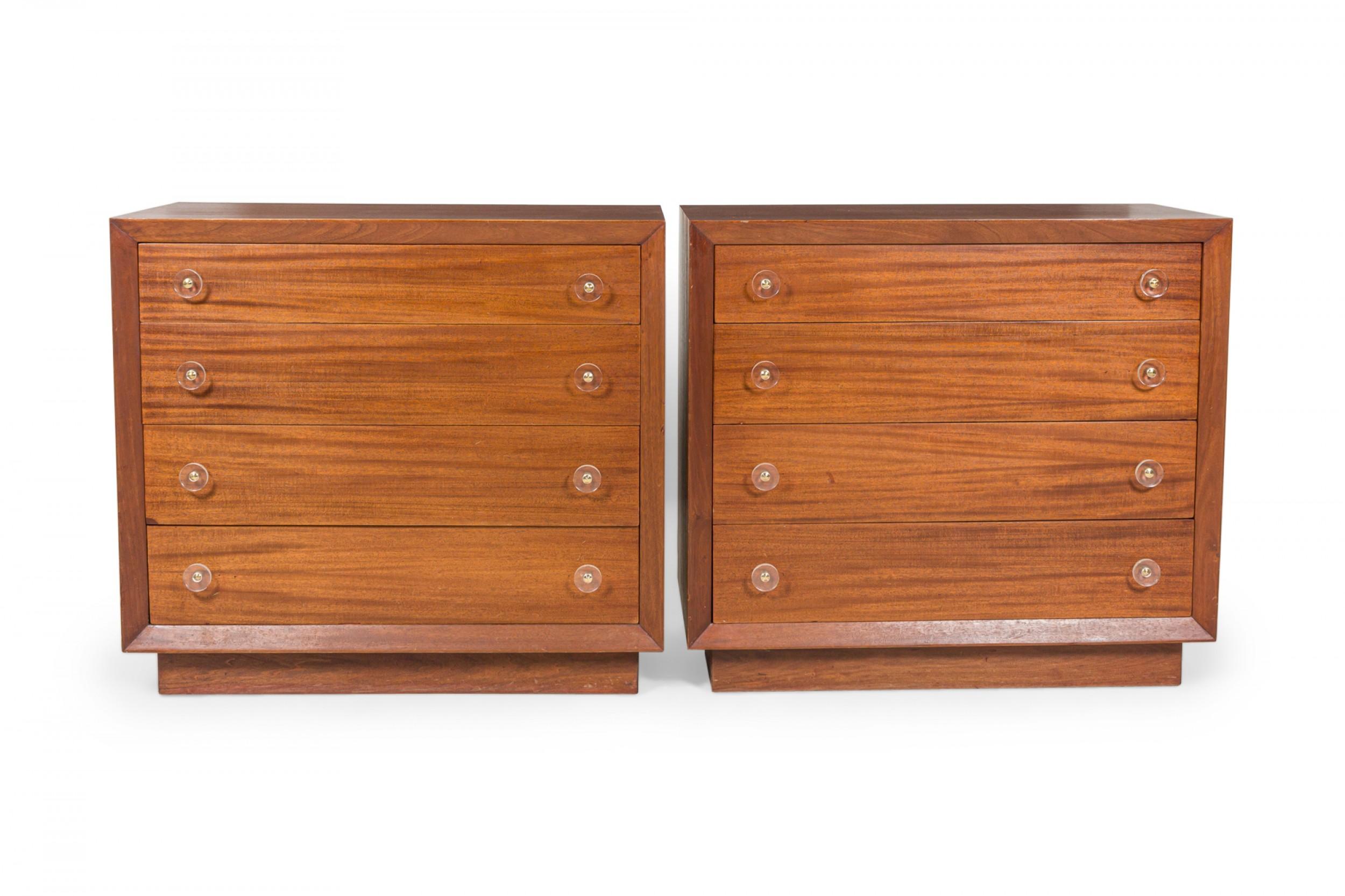 Pair of mid-century ribbon mahogany four-drawer commodes with disk-shaped lucite drawer pulls. (Modern Age)(Priced as Pair).