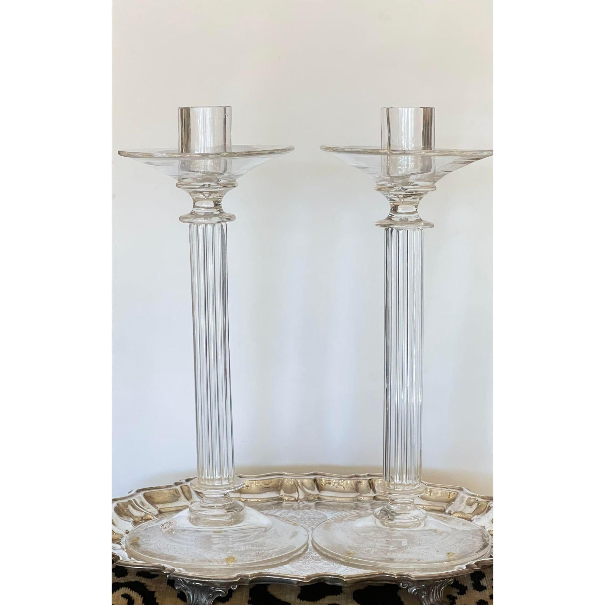 Pair of modern archimede Seguso murano glass crystal candlesticks. Each with a simple fluted neoclassical form. Each signed Archimede segura, murano.

Additional information: 
Materials: crystal, murano glass
Color: transparent
Brand: