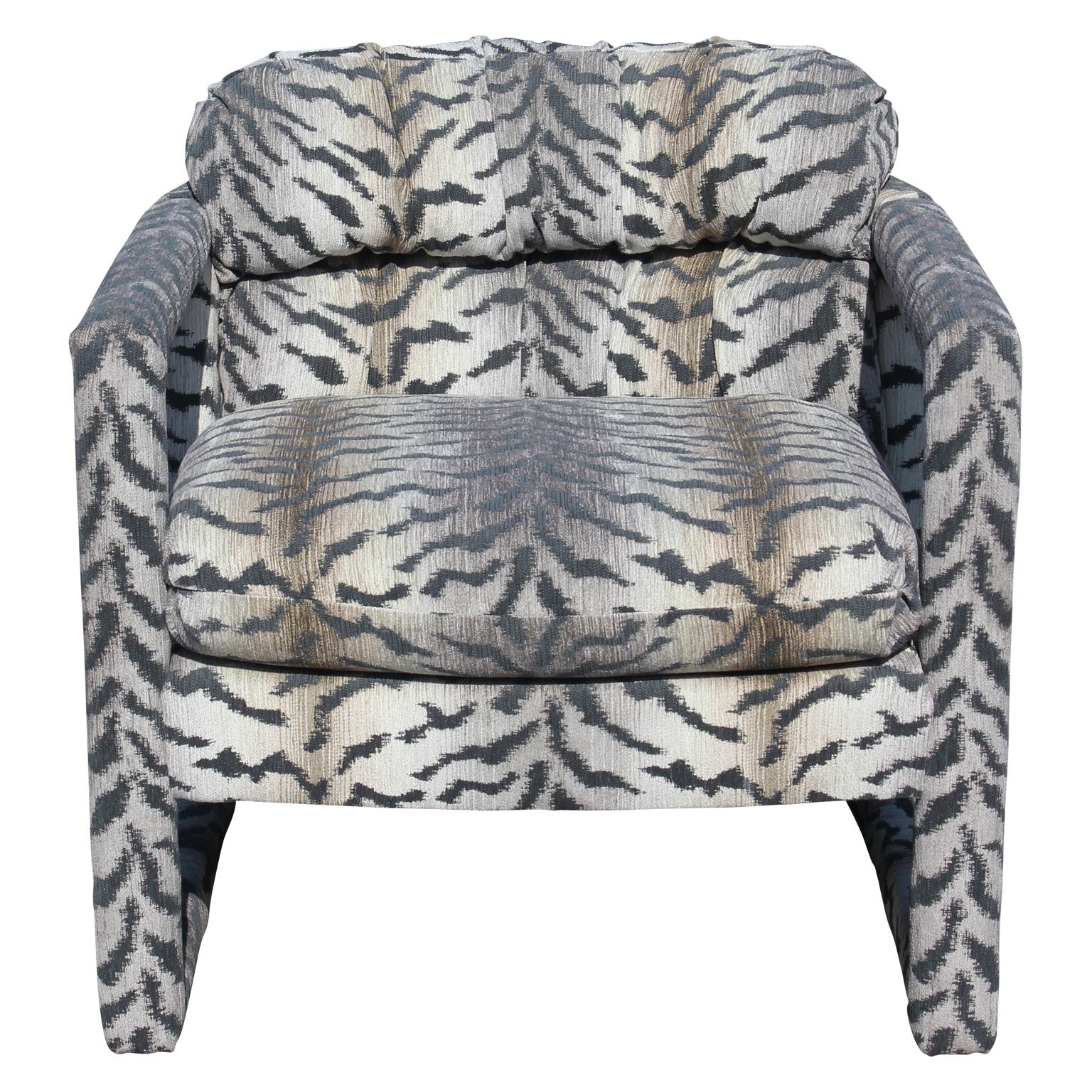 Lovely pair of Parson style barrel back lounge chairs by Drexel, in the style of Milo Baughman. Freshly upholstered in a lovely tiger pattern by Kravet.
