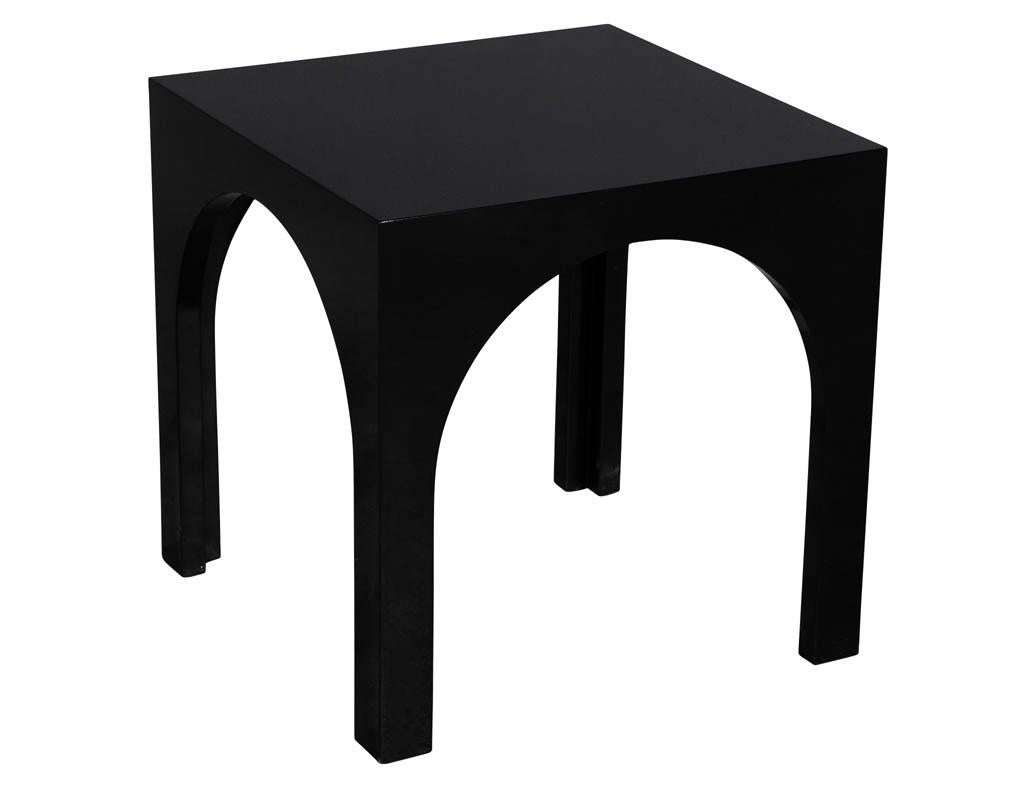 Pair of modern black lacquered polished end tables. Featuring hand polished high gloss finish with modern curved arch half dome design.

Price includes complimentary scheduled curb side delivery service to the continental USA.