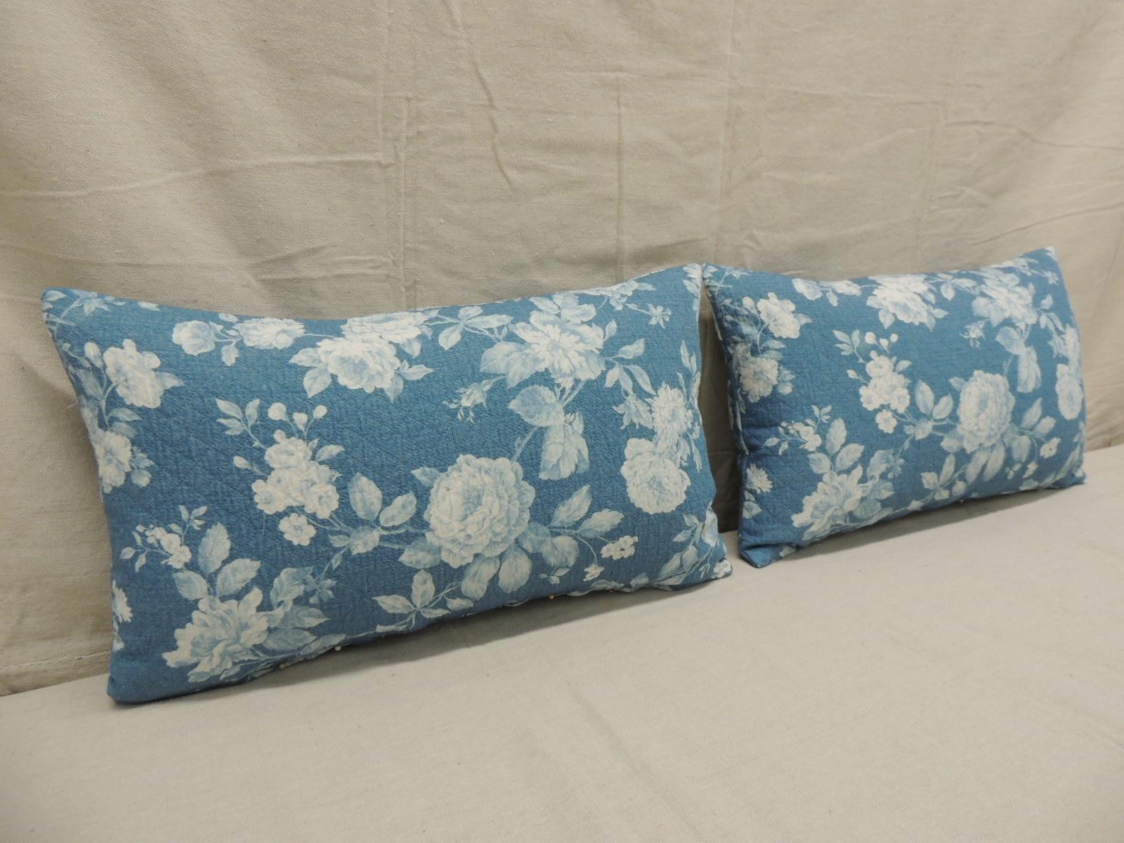 Pair of modern blue and white quilted cotton floral decorative lumbar pillows.
Decorative pillow handcrafted and designed in the USA.
Closure by stitch (no zipper closure) with custom-made pillow insert.
Size: 12
