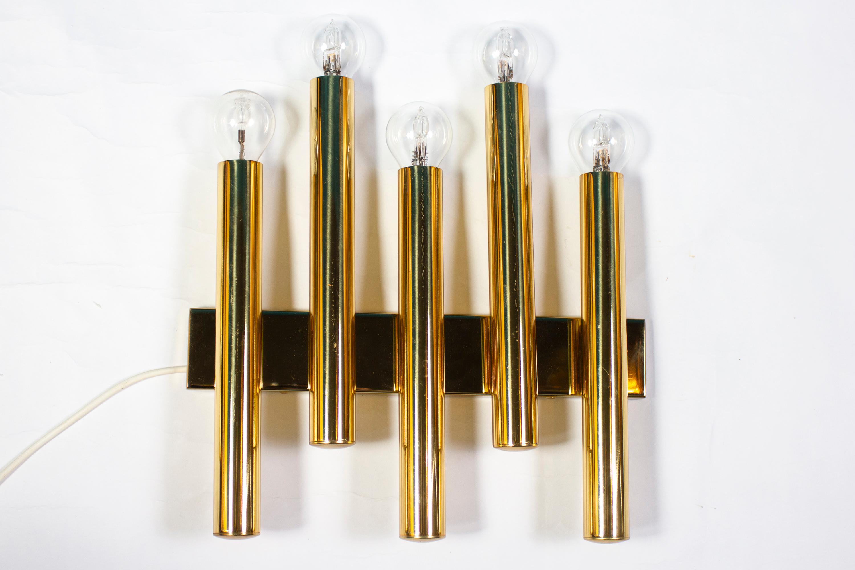 Pair of brass sconces  by Gaetano Sciolari.
Each with five E 14 light bulbs. 
 Available 2 pairs with 5 light.
 2 pairs with 3 lights 
2 pairs with 2 lights 
 2 pairs with 1 light