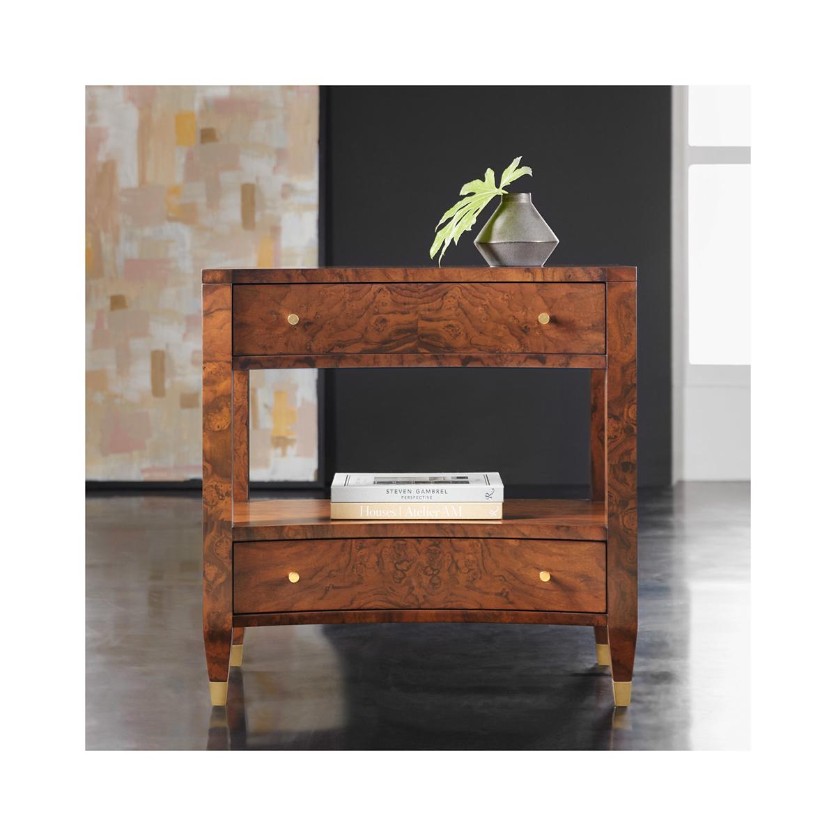 Modern Burl Nightstand, made with exotic burl walnut veneers, with a concave form front with two drawers and an open shelf space. Each drawer with polished brass knobs and with square tapered legs on brass feet.

Dimensions: 30