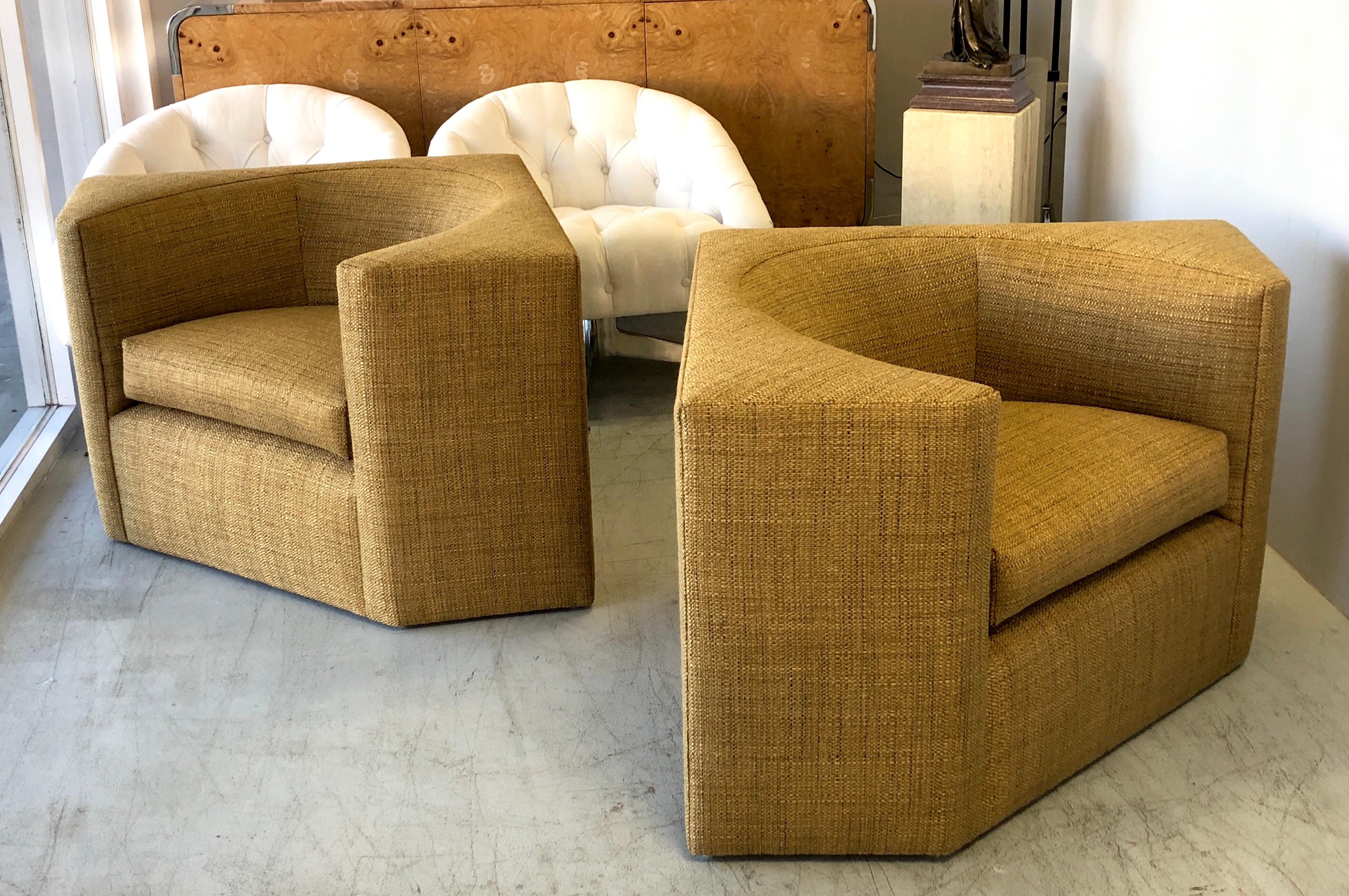 A pair of 1970s cube Lounge chairs attributed to Steve Chase. Great looking from any angle and very comfortable.