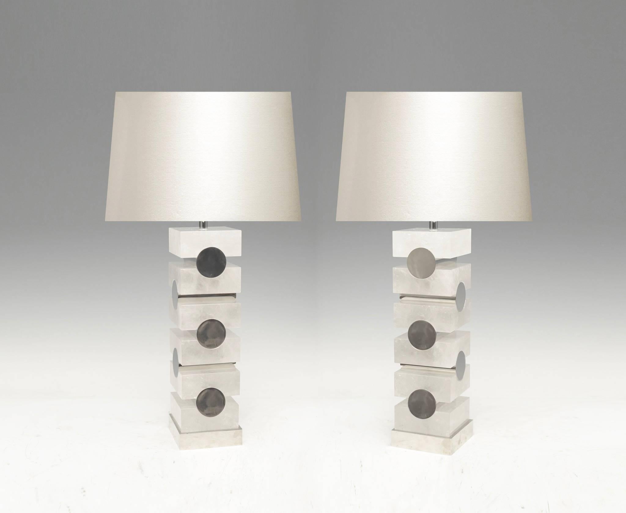 A pair of modern cubic style rock crystal lamps with polish nickel inserted decoration. Created by Phoenix Gallery.
