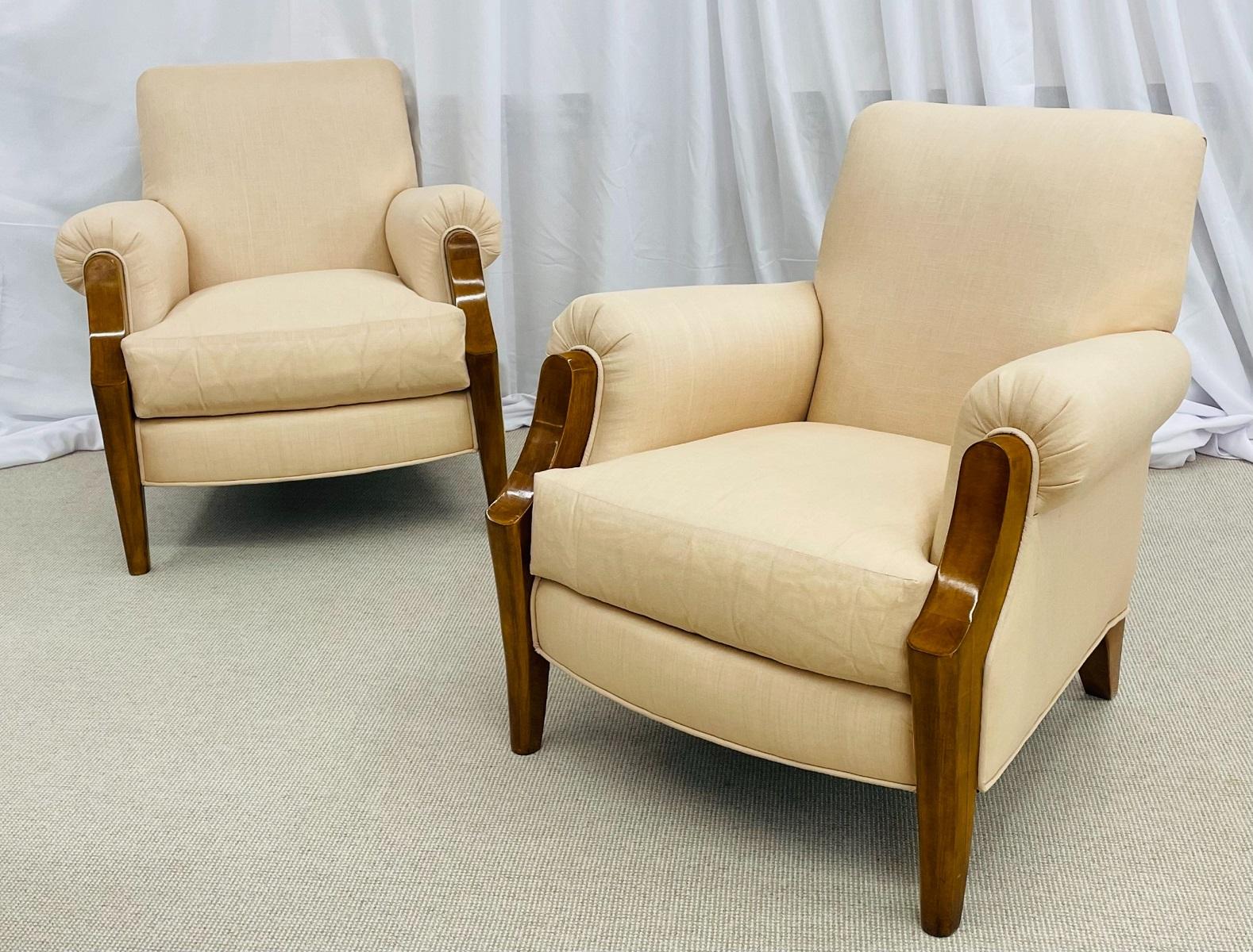 Pair of Dakota Jackson Style arm/lounge chairs, America, 1980s
This pair of sturdy wide arm chairs are sleek and stylish and are certain to add glamour to any setting in the home or office.
Newly upholstered in a neutral beige colored linen