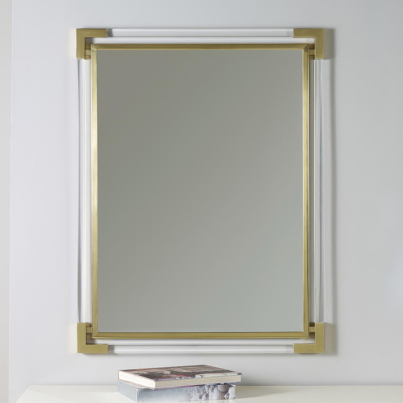 This architectural mirror achieves a striking sense of lightness through its innovative combination of crystal-clear Lucite rods and polished brass framework.

The mirror's ethereal design brings contemporary sophistication to any interior setting.